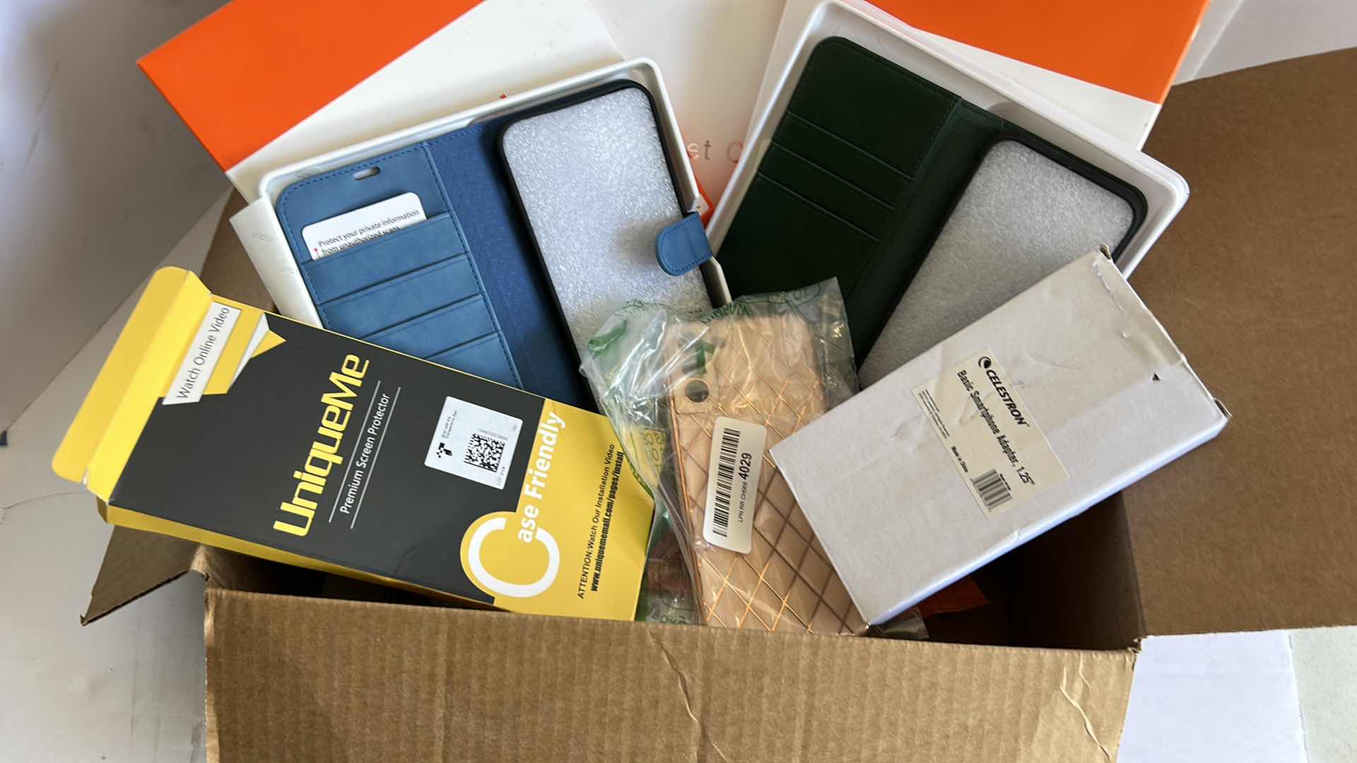 Photo 1 of BOX FULL OF CELL PHONE ACCESSORIES