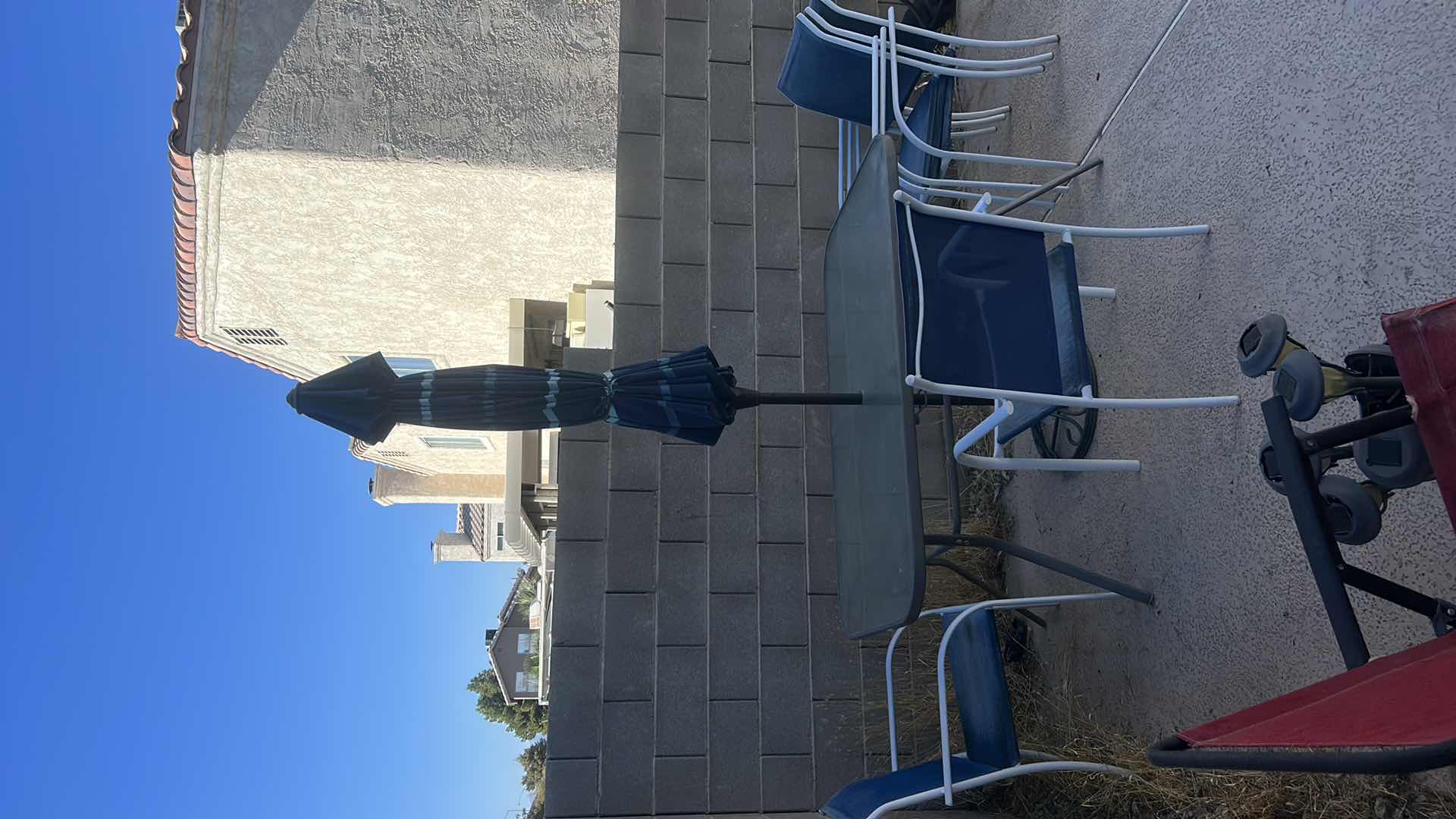 Photo 9 of PATIO TABLE AND 5 CHAIRS W UMBRELLA