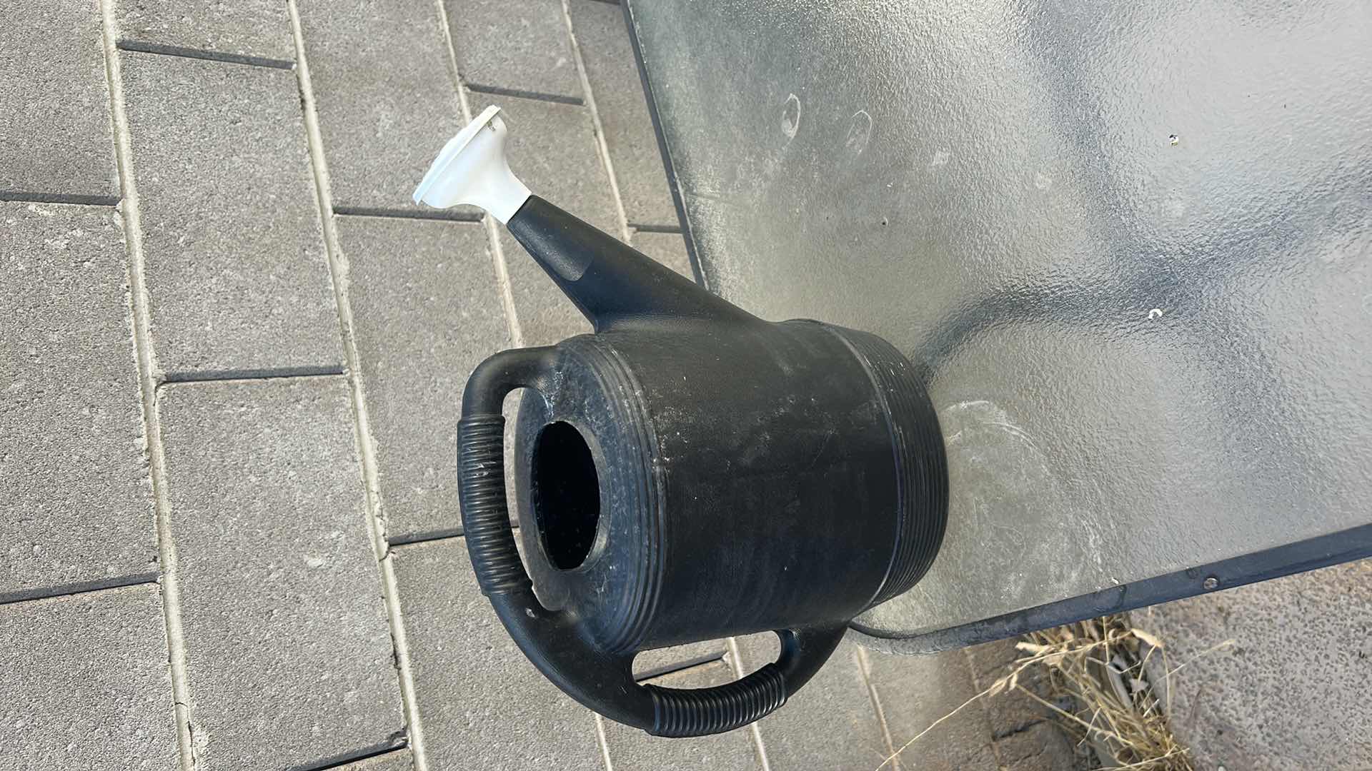 Photo 4 of TWO OUTDOOR TABLES, UMBRELLA (NEEDS LOWER POLE) AND WATERING JUG