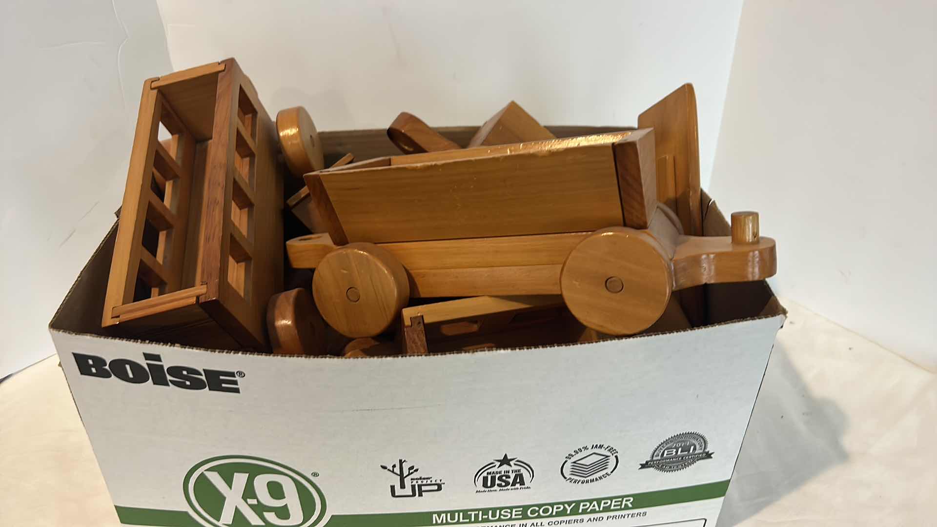 Photo 2 of BOX OF VINTAGE WOOD TOY TRAIN SET ENGINE MEASURES 14” x 7”