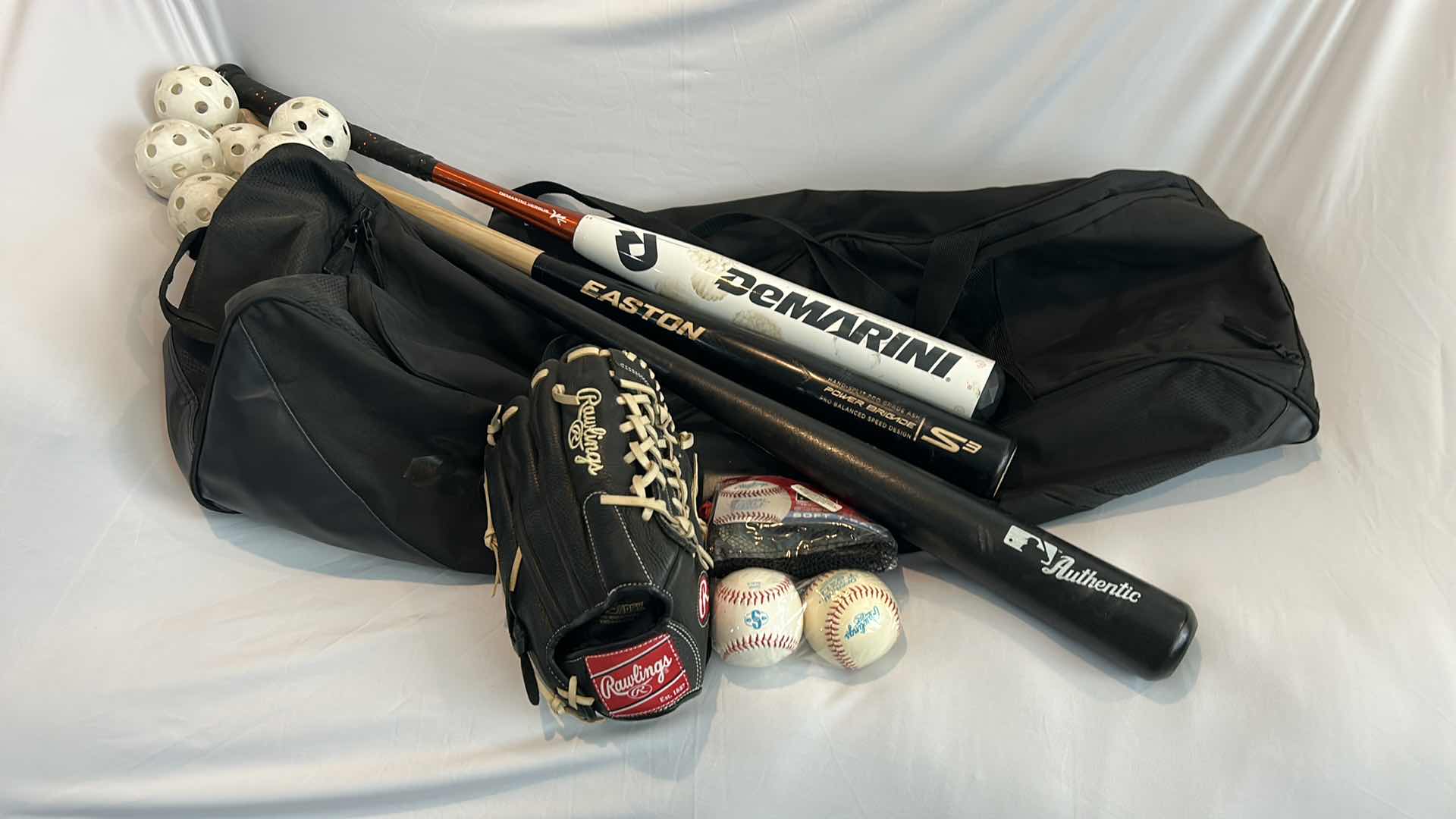 Photo 13 of DEMARINI BASEBALL BAG WITH CONTENTS 3 BASEBALL BATS, GLOVE, BASEBALLS, WIFFLE BALLS