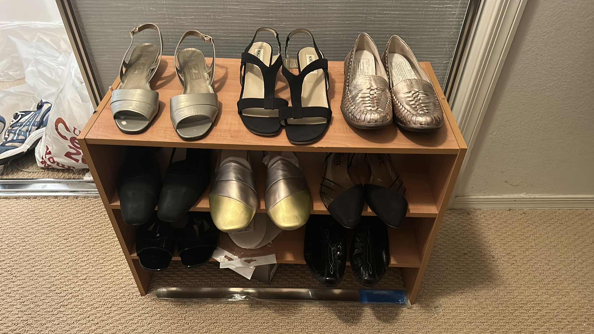 Photo 2 of WOMENS SHOE ASSORTMENT SIZE 11 PLUS SHOE RACK