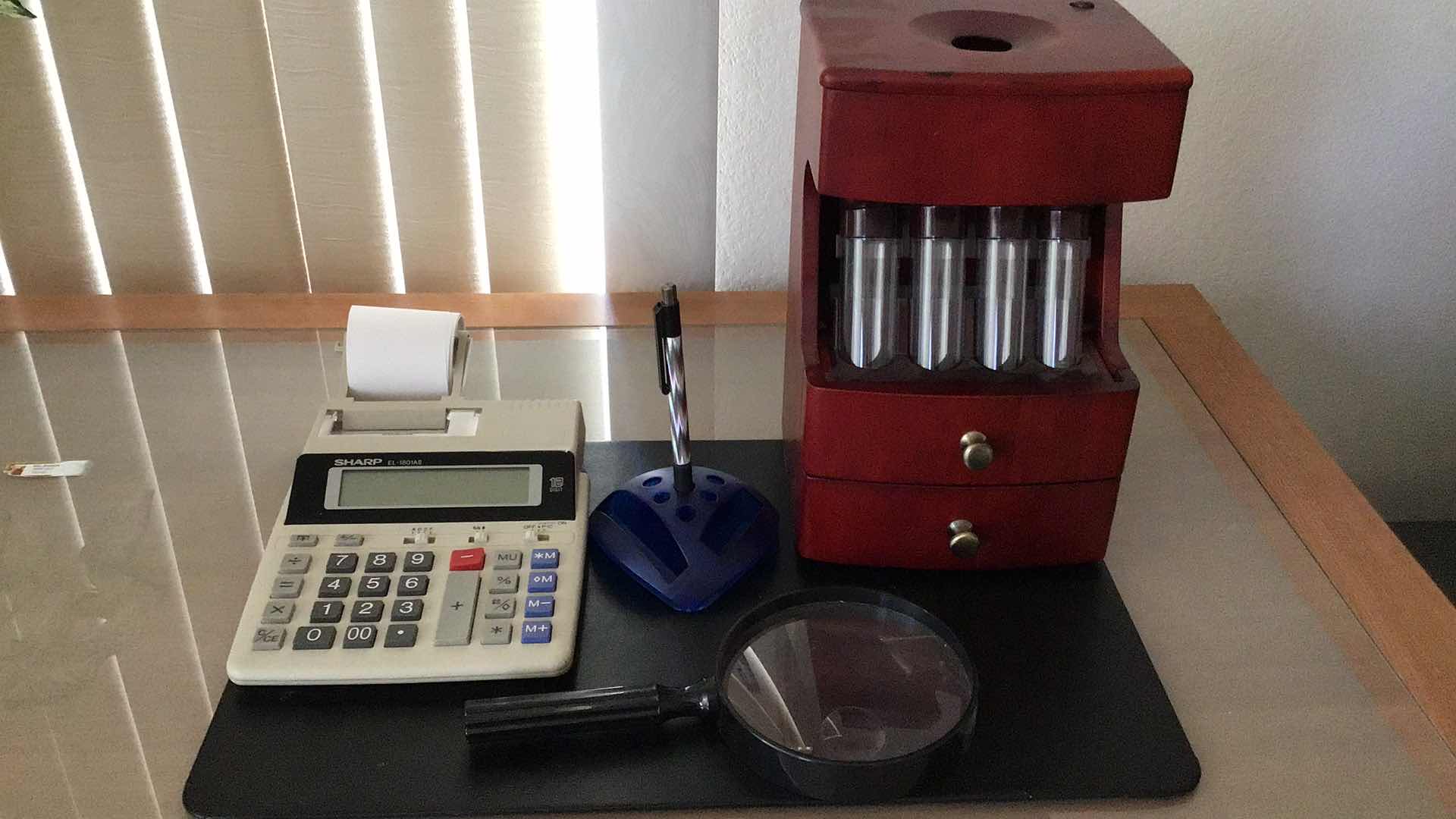 Photo 1 of OFFICE ASSORTMENT AUTOMATED CHANGE BANK, CALCULATOR AND MORE