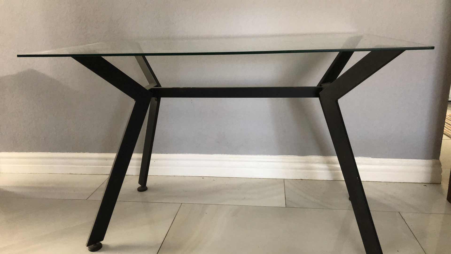 Photo 1 of GLASS TOP TABLE 
49” X 28” H 31”