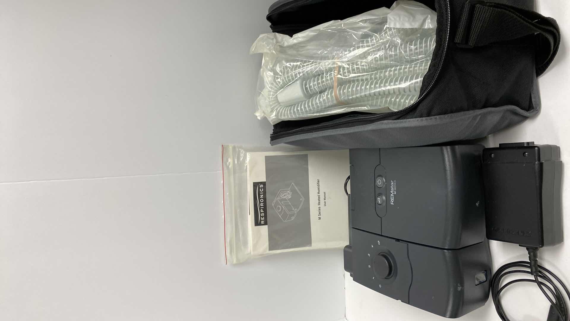 Photo 1 of RESPIRONICS C-PAP WITH MANUAL AND BAG