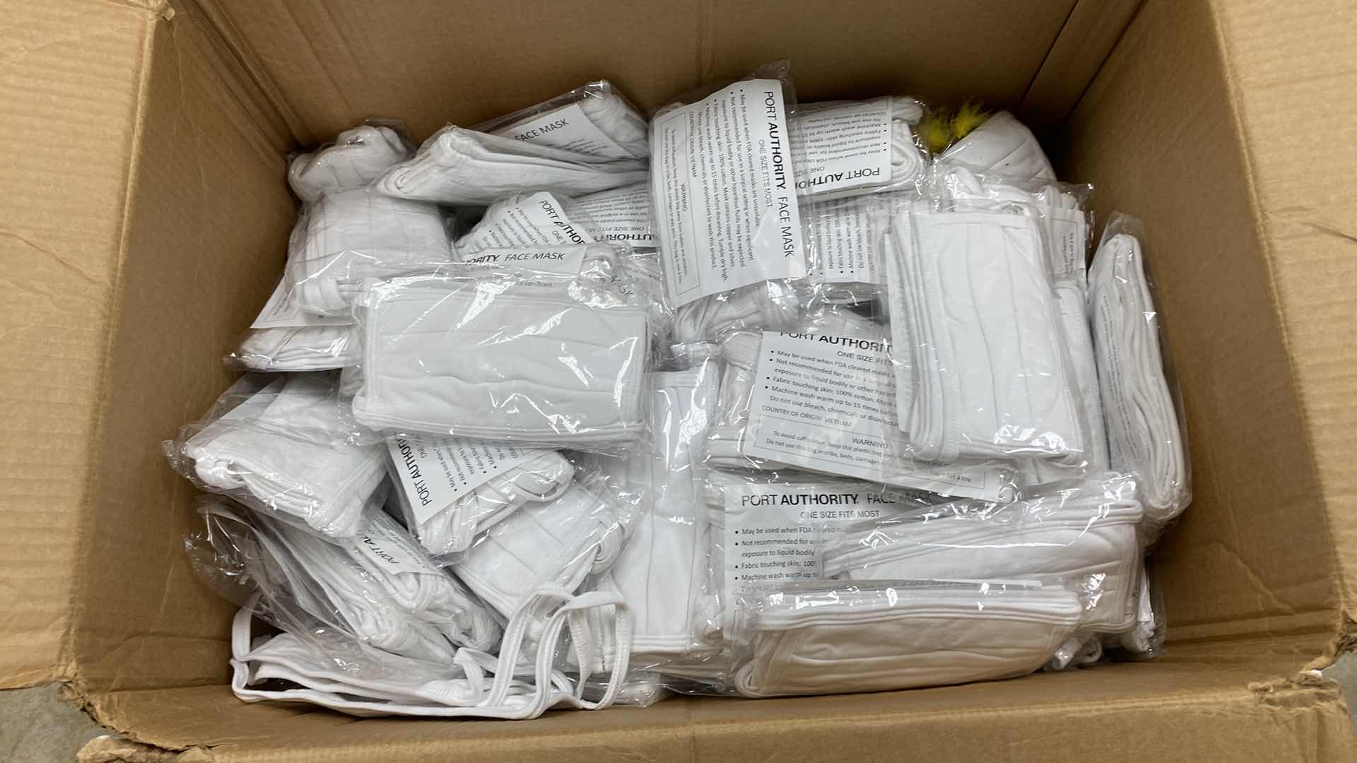 Photo 1 of BOX OF WHITE CLOTH FACE MASKS