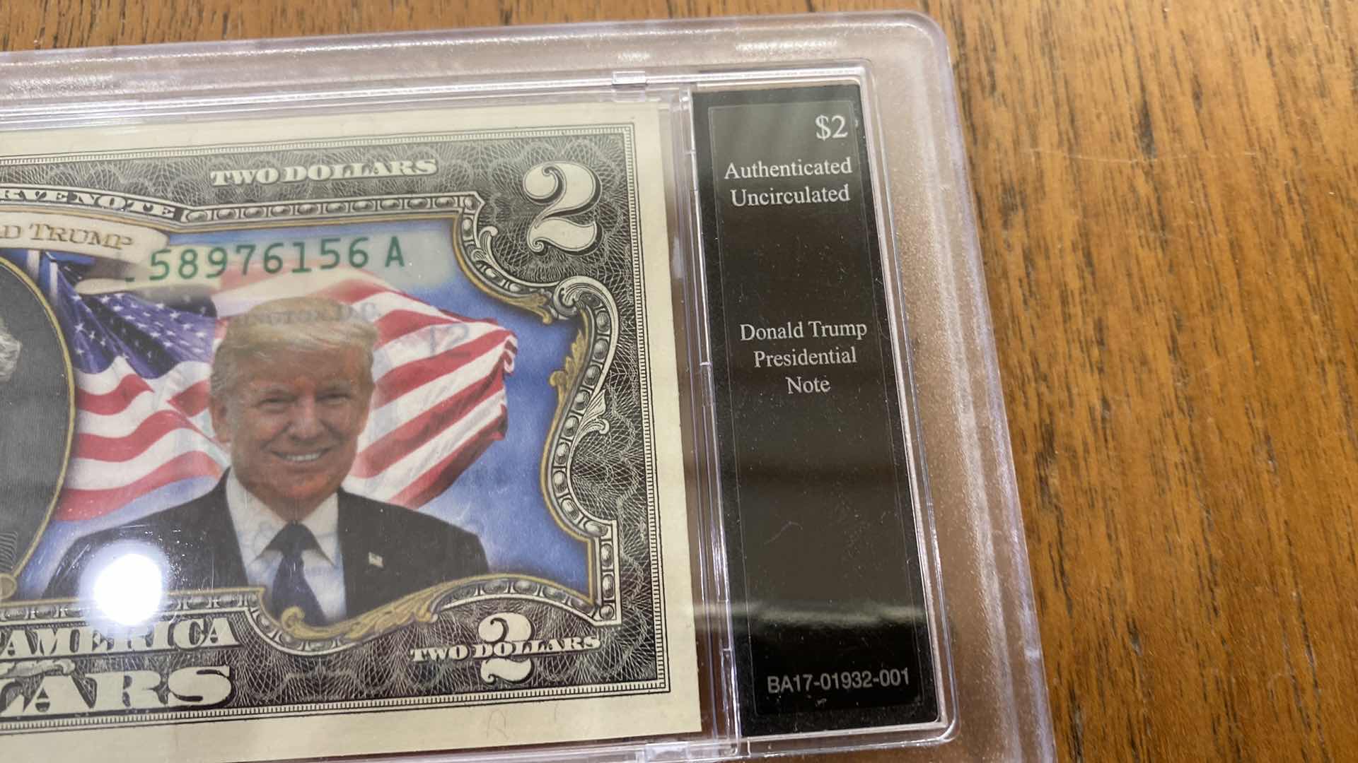 Photo 3 of UNCIRCULATED PRESIDENT TRUMP $2. NOTE AND PRESIDENTIAL LEADERSHIP LIBERTY DOLLAR