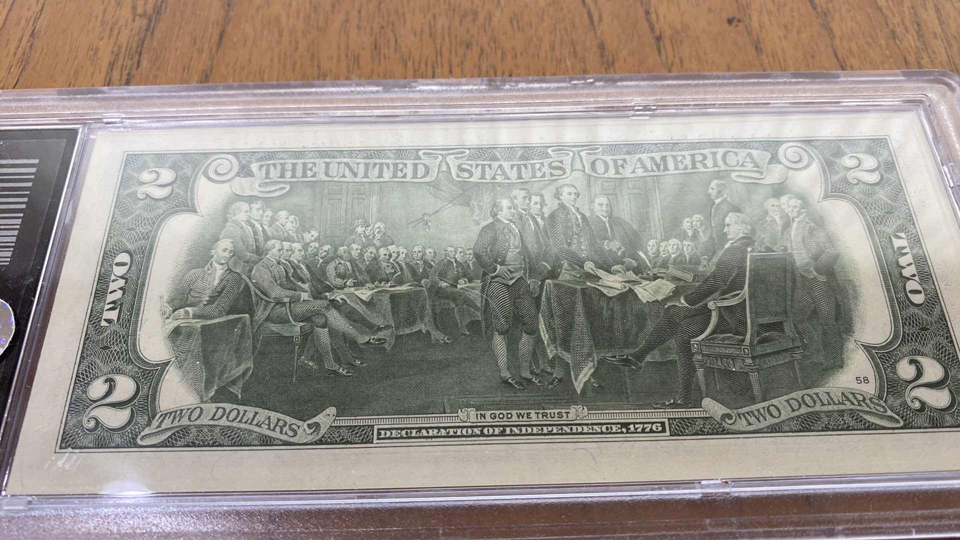 Photo 4 of UNCIRCULATED PRESIDENT TRUMP $2. NOTE AND PRESIDENTIAL LEADERSHIP LIBERTY DOLLAR