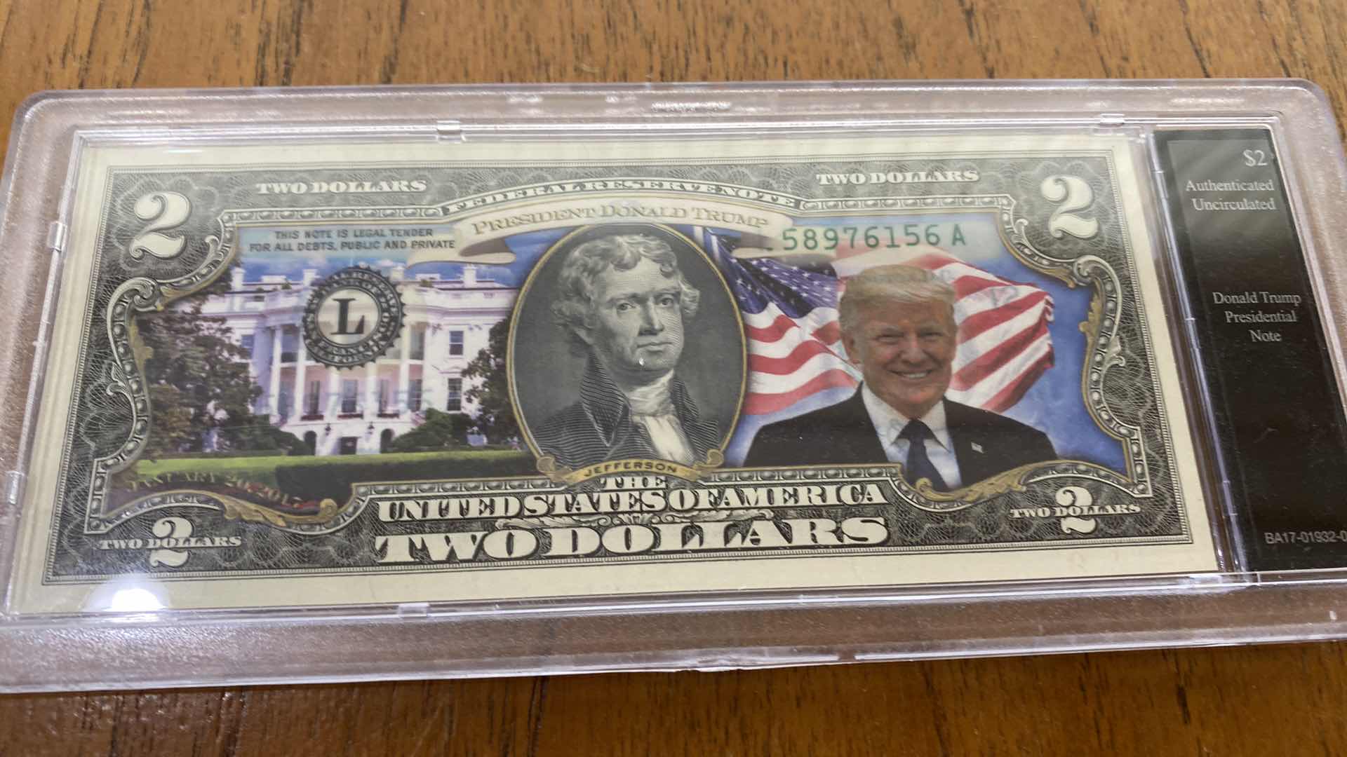 Photo 2 of UNCIRCULATED PRESIDENT TRUMP $2. NOTE AND PRESIDENTIAL LEADERSHIP LIBERTY DOLLAR