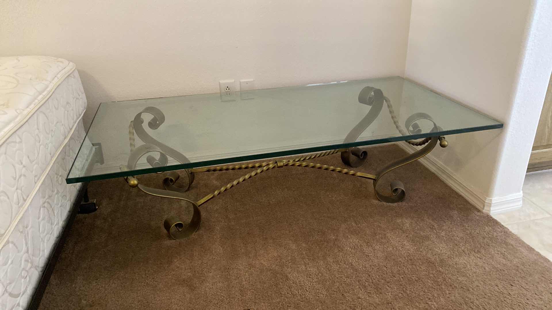 Photo 3 of ANTIQUE BRASS IRON AND 1/2” GLASS COCKTAIL TABLE 60” x 29 1/2”