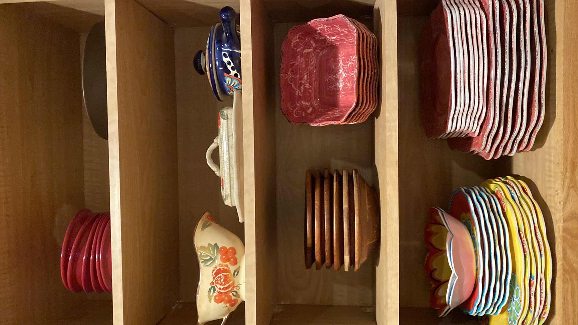 Photo 1 of CONTENTS KITCHEN CABINET MELAMINE DISHES, CERAMIC SERVE WARE AND WOOD BOWLS