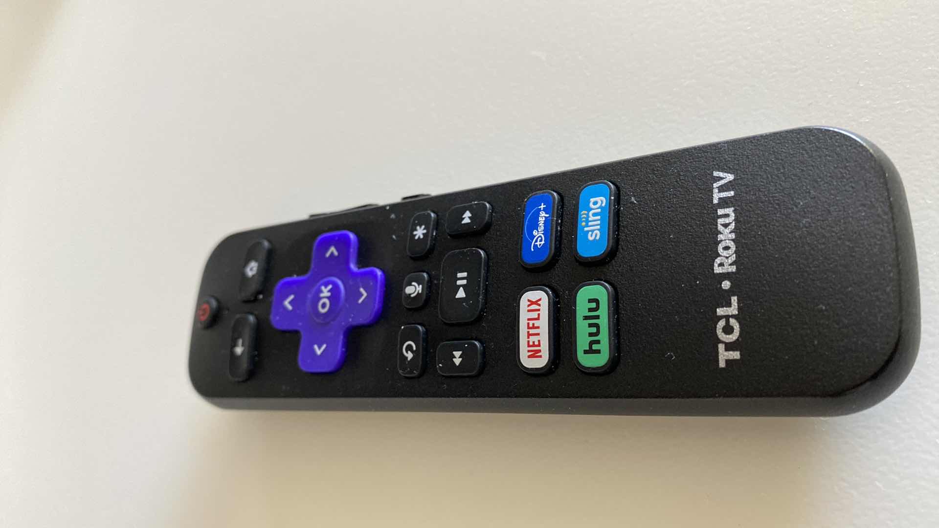 Photo 3 of TCL 65” ROKU TV WITH REMOTE