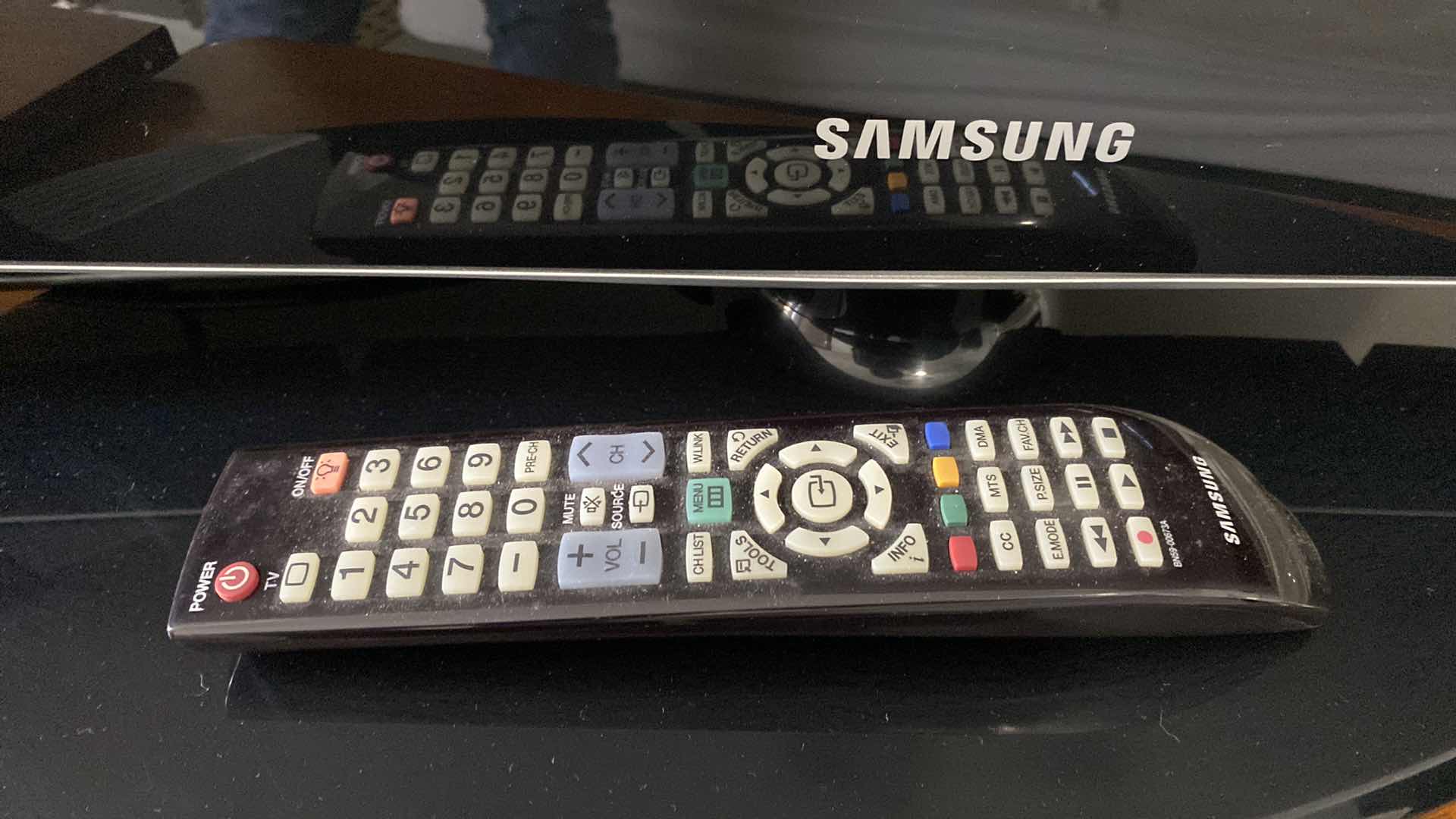 Photo 2 of SAMSUNG 40” TV WITH REMOTE