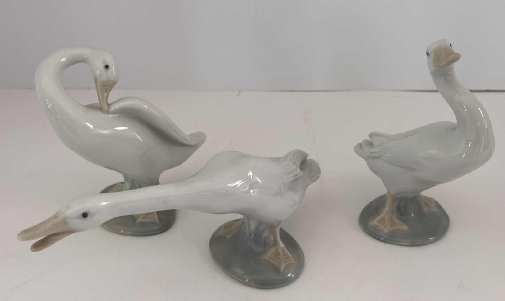 Photo 1 of LLADRO FIGURINES SET OF 3 GEACEFUL GOOSE H 4.25” 