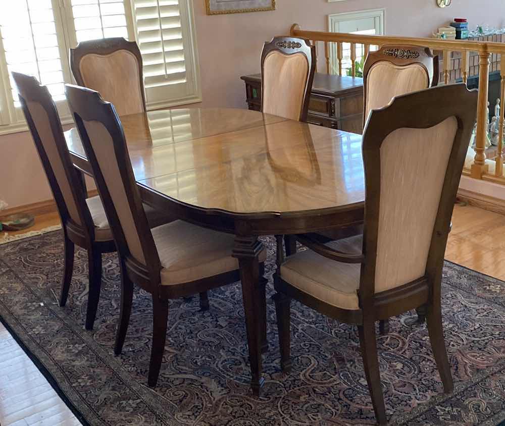 Photo 1 of FORMAL DINING ROOM TABLE WITH 6  CHAIRS AND 2 LEAFS, TABLE FELTS MEASUREMENT WITHOUT LEAFS 65“ x 43 1/2“ H 29 1/2” LEAFS 18”