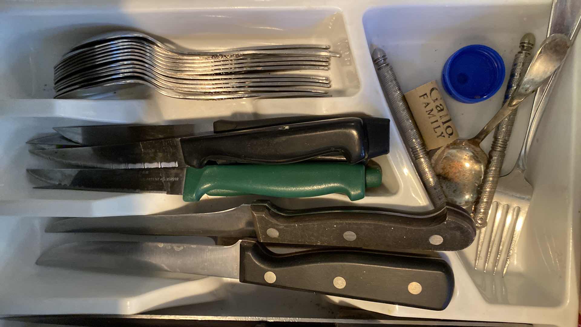 Photo 3 of KITCHE DRAWER OF SILVERWARE AND WASHINGTON FORGE KNIVES