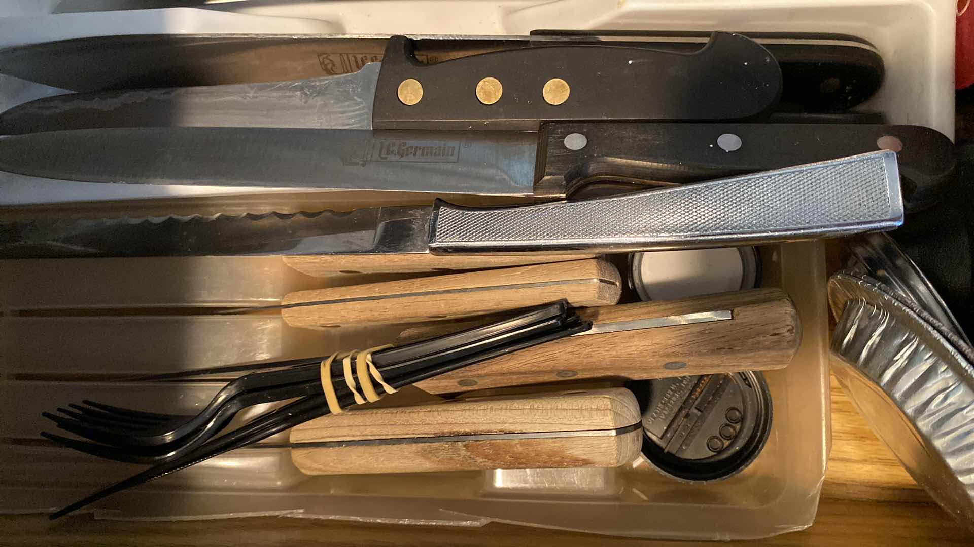 Photo 2 of KITCHE DRAWER OF SILVERWARE AND WASHINGTON FORGE KNIVES