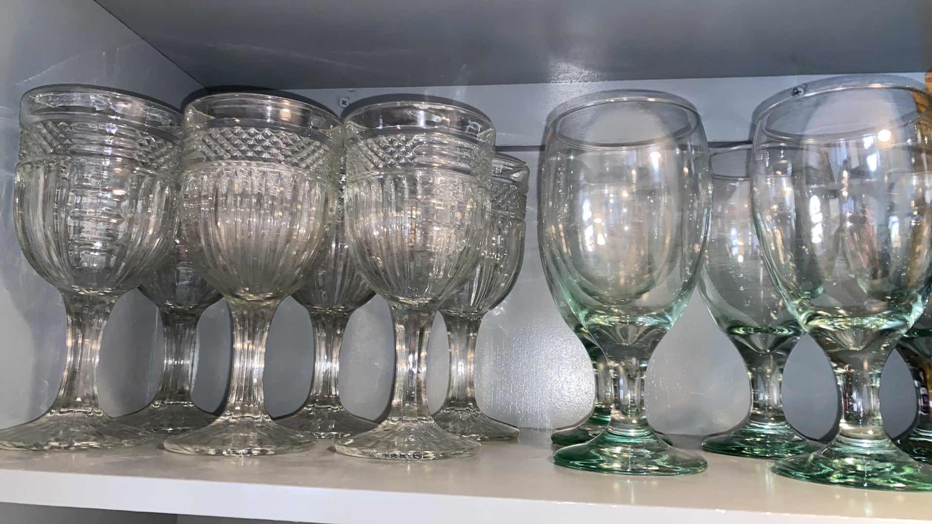 Photo 2 of CONTENTS OF KITCHEN CABINET GLASSWARE AND MORE