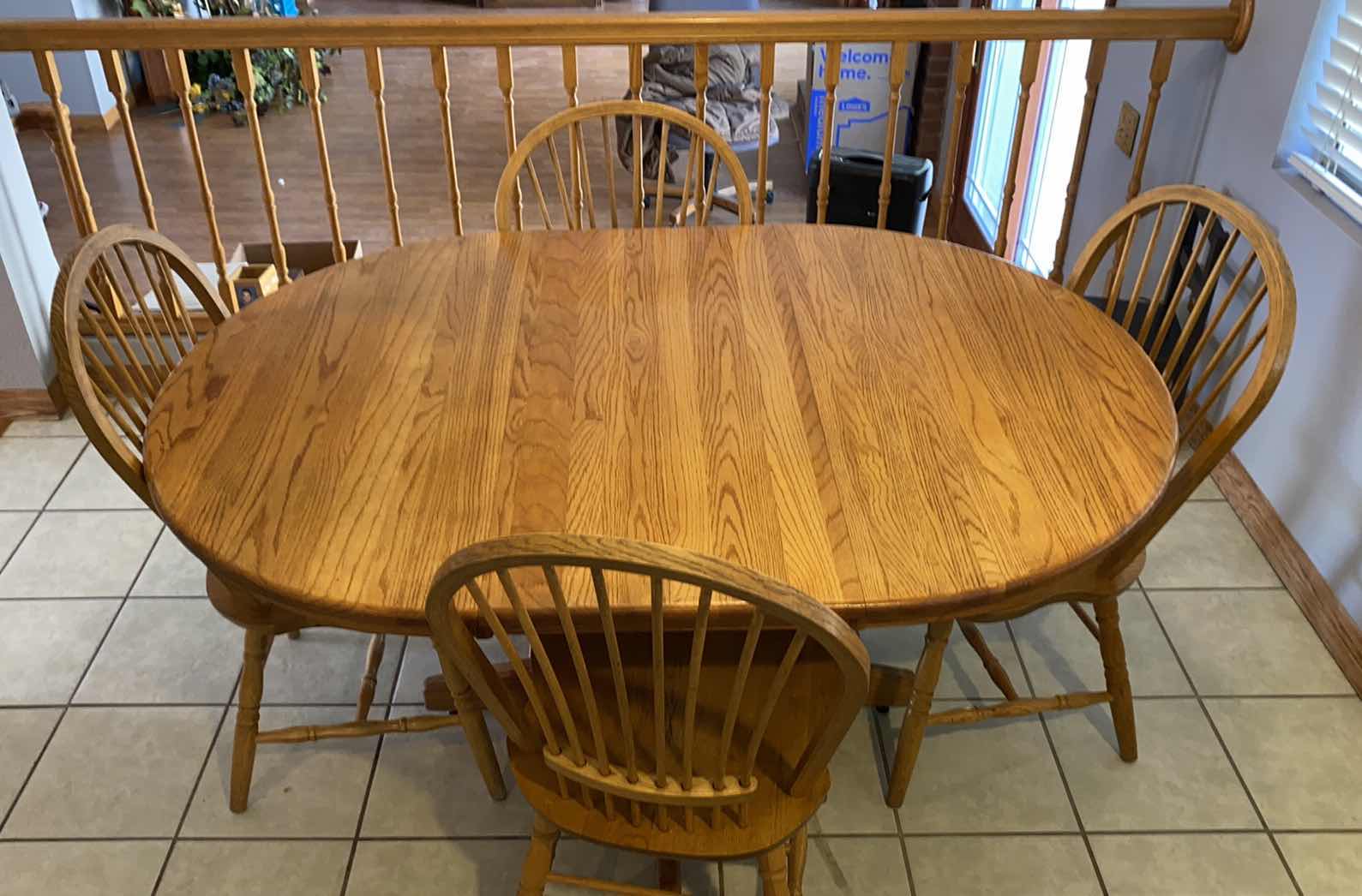 Photo 1 of OAK OVAL TABLE WITH 4 CHAIRS 60” x 42“ H 29