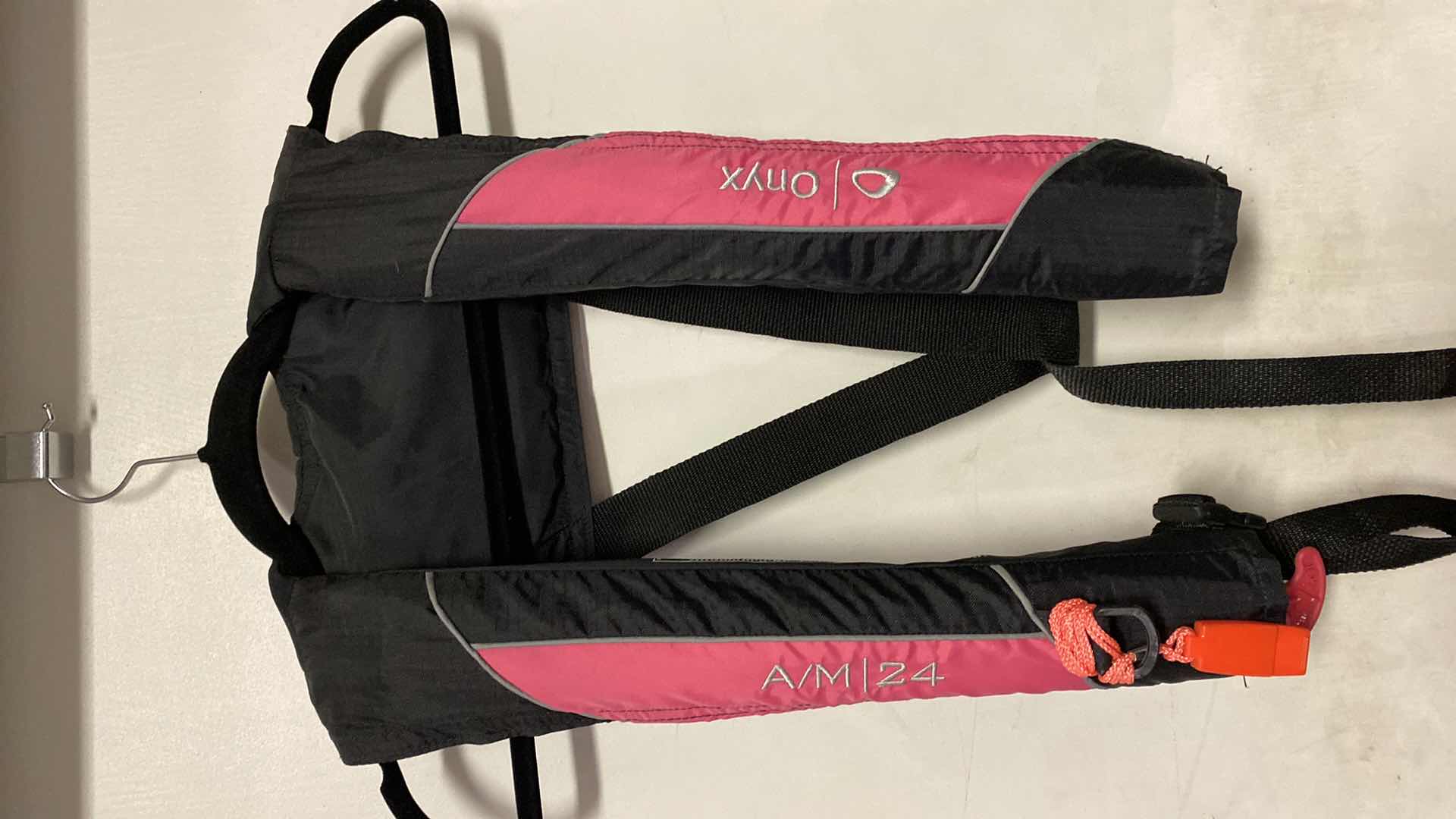 Photo 2 of AM/24 ONYX MANUAL/AUTO PINK LIFE JACKET USED FOR PADDLE BOARDING