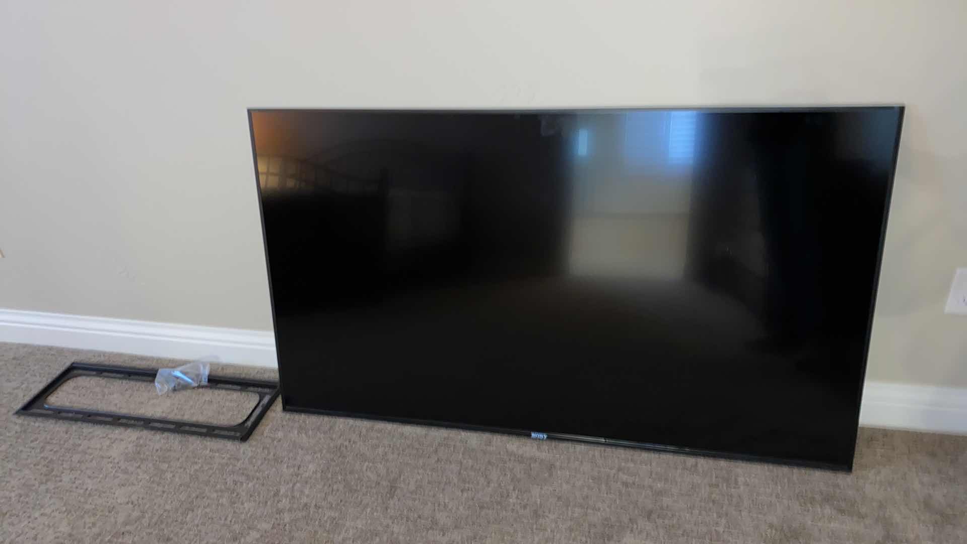 Photo 1 of SONY 65” TV. INCLUDES WALL BRACKET