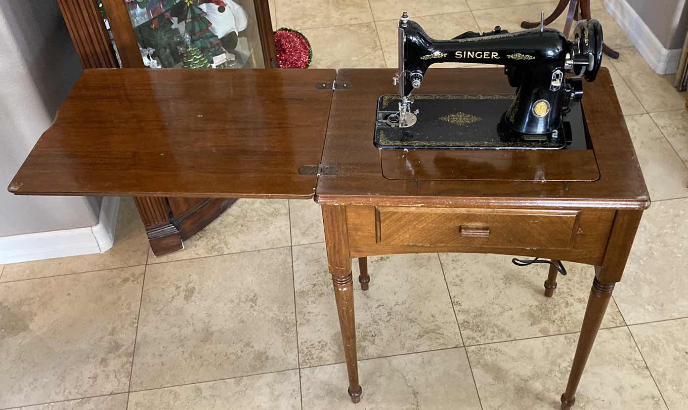Photo 1 of ANTIQUE SINGER SEWING MACHINE IN CABINET 24“ x 17” H 30”