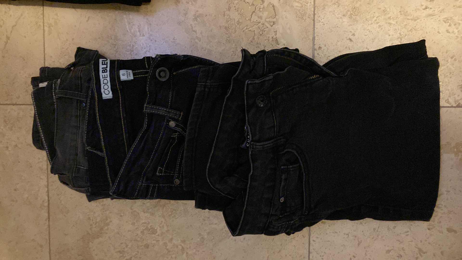 Photo 4 of WOMENS SIZE 6 AND 8 JEANS, TOPS AND ATHLETIC PANTS