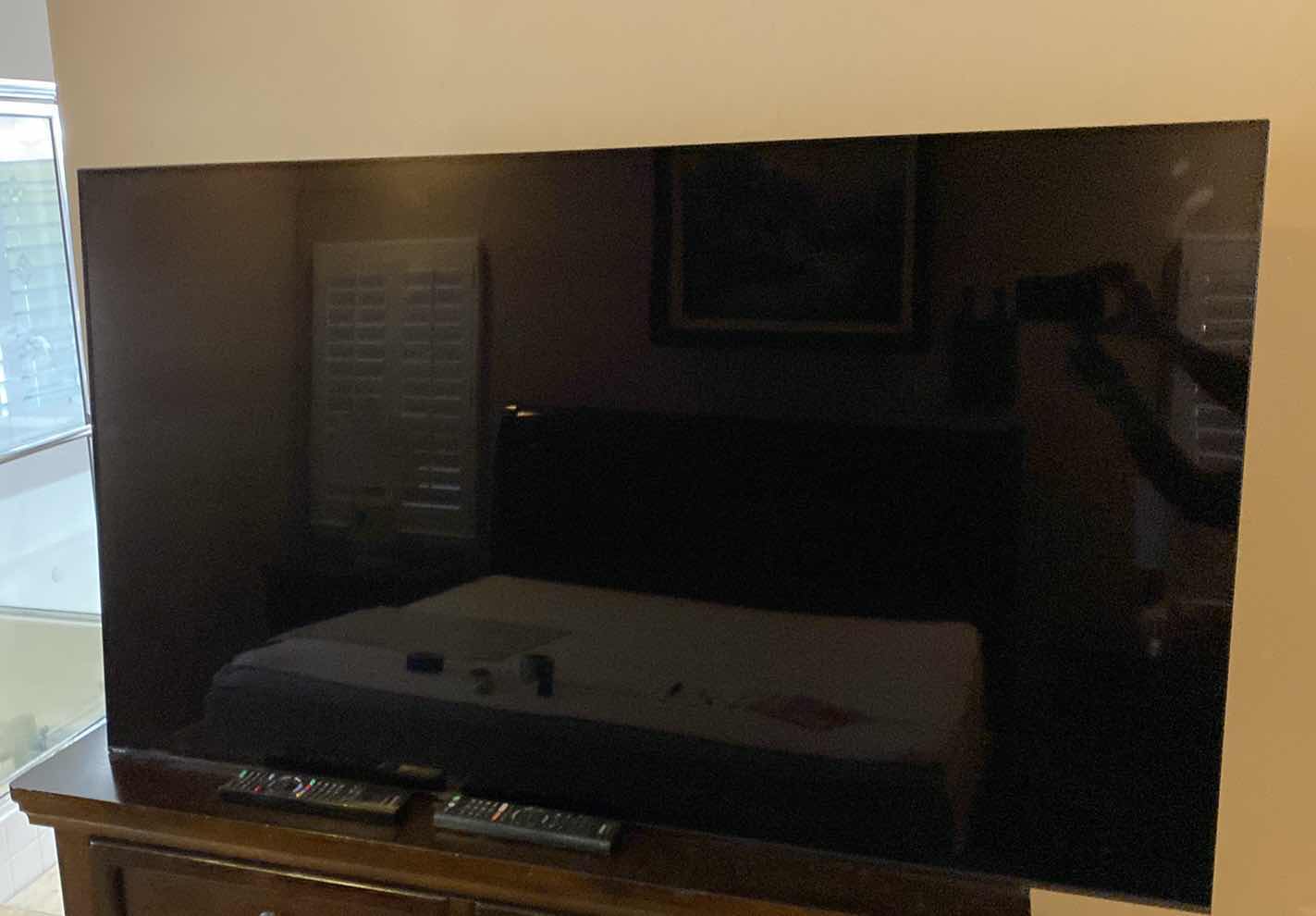 Photo 1 of SONY 56” TV WITH REMOTE AND PANASONIC BLUE RAY DISC PLAYER WITH REMOTE - BUYER TO DISASSEMBLE