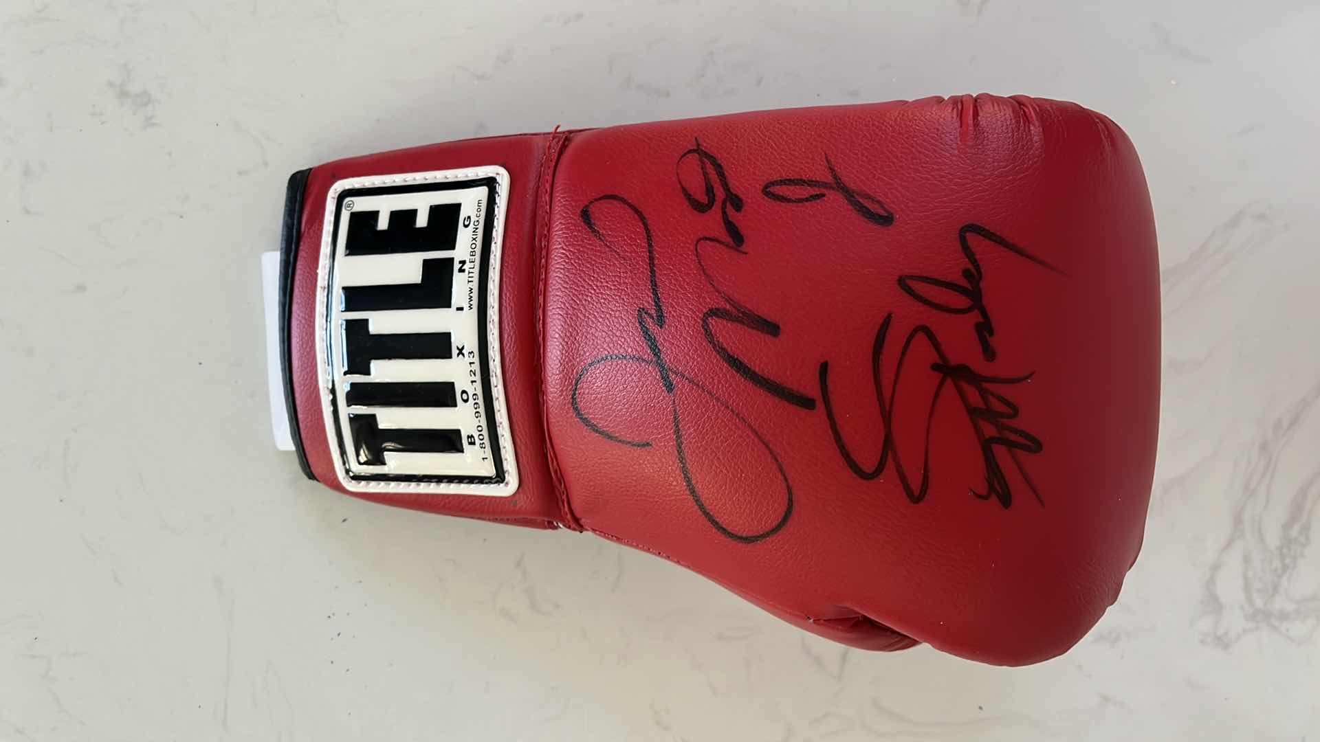 Photo 3 of RED TITLE BOXING GLOVE SIGNED BY “SUGAR” SHANE MOSLEY AND FLOYD MAYWEATHER Jr.