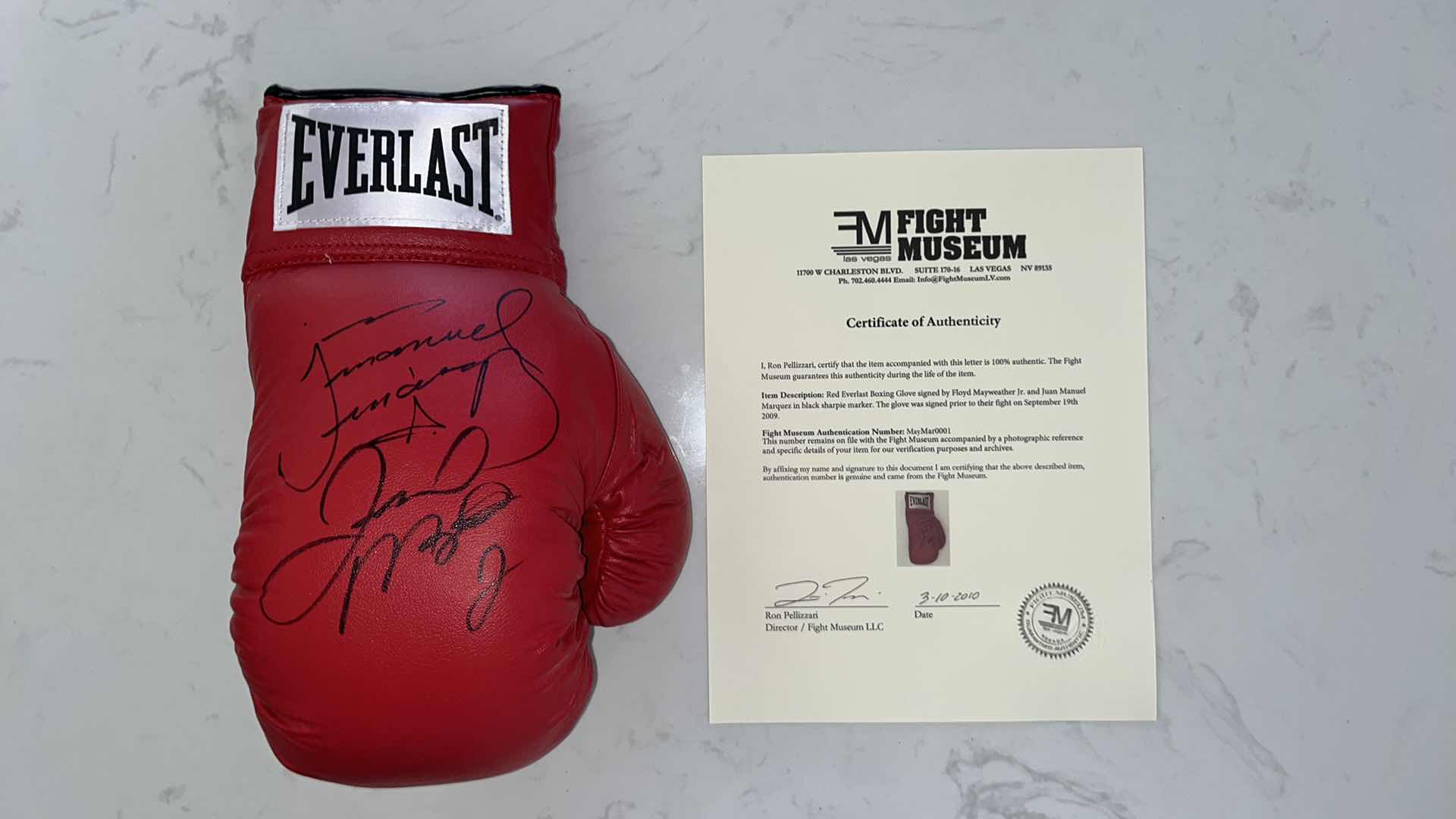 Photo 1 of RED EVERLAST BOXING GLOVE AUTOGRAPHED BY FLOYD MAYWEATHER Jr. & JUAN MANUEL MARQUEZ