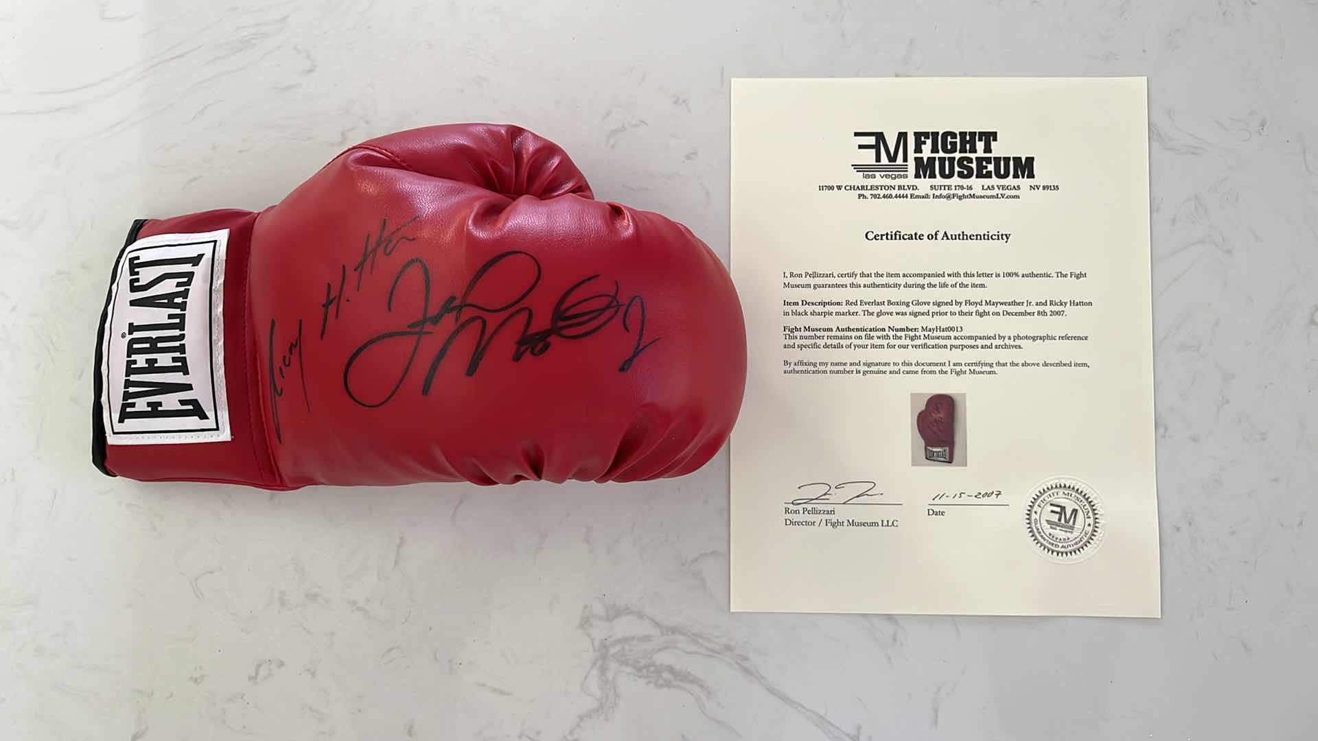 Photo 1 of RICKY HATTON AND FLOYD MAYWEATHER Jr. AUTOGRAPHED GLOVE