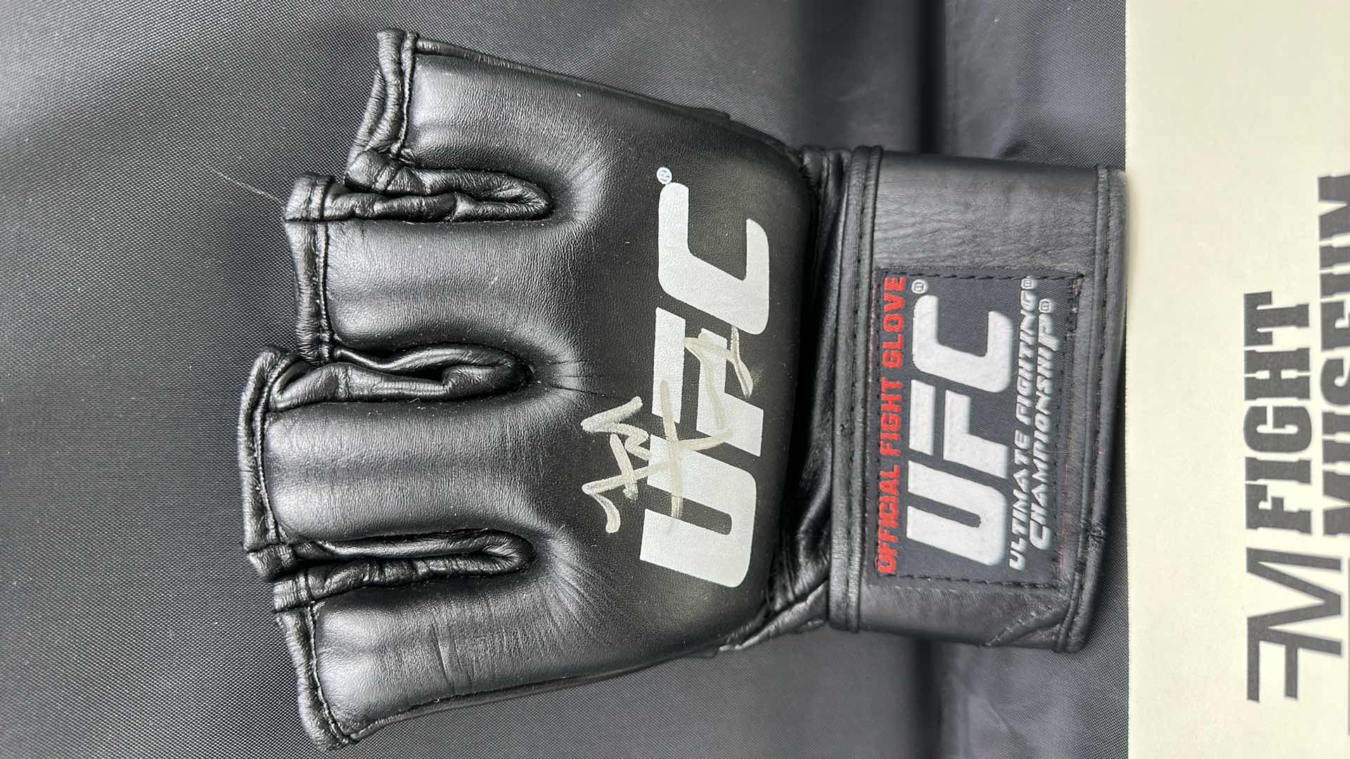 Photo 2 of FRANK TRIGG SIGNED UFC GLOVE W COA