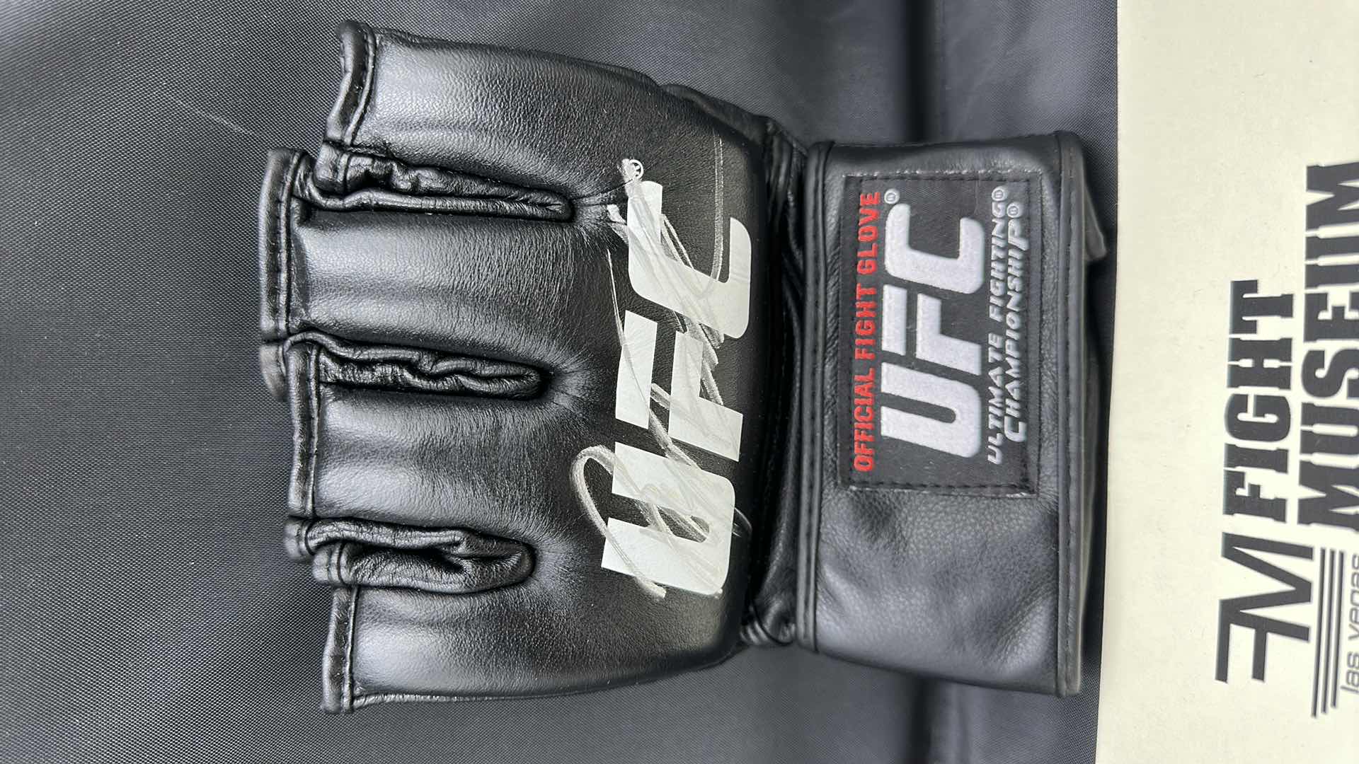 Photo 2 of RYAN BADER SIGNED UFC GLOVE W COA