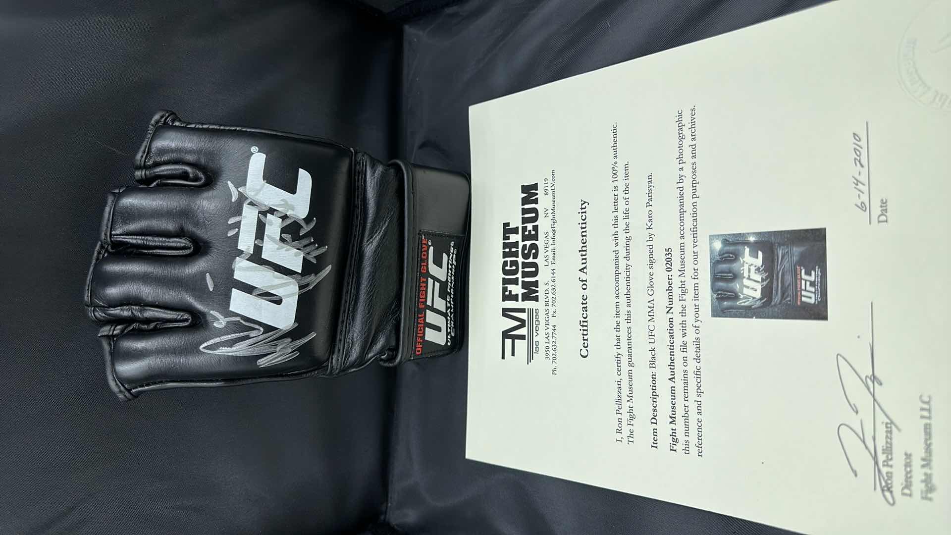 Photo 1 of KARO PARISYAN SIGNED UFC GLOVE W COA