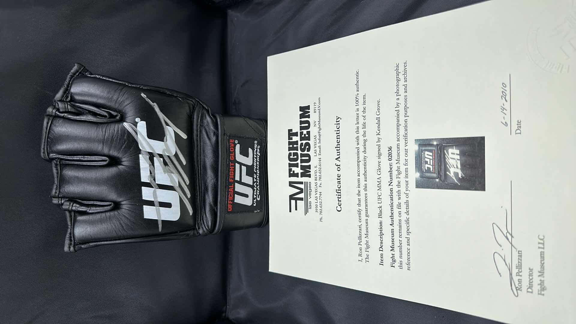 Photo 1 of KENDALL GROVE SIGNED UFC GLOVE W COA