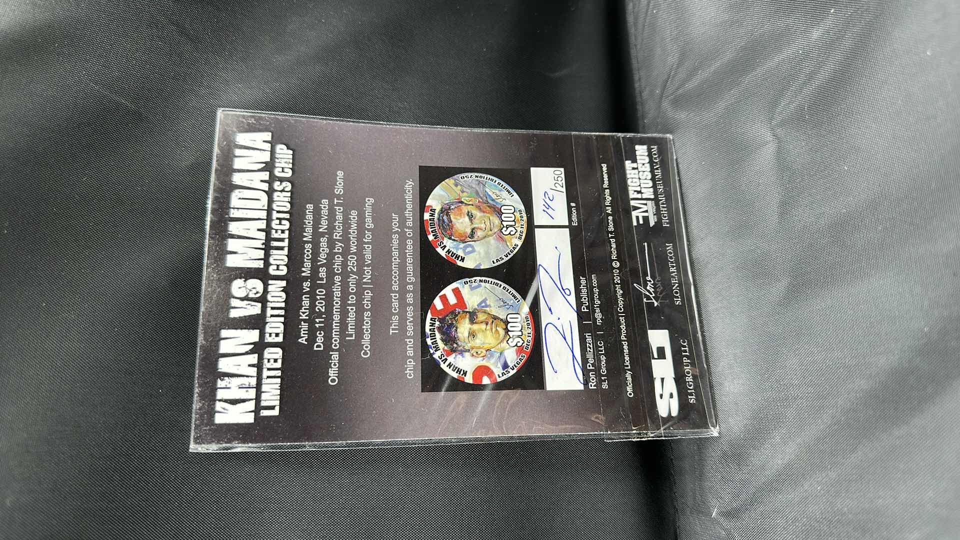 Photo 2 of KHAN VS MAIDANA LIMITED EDITION $100 COLLECTORS COIN NUMBERED 142/250