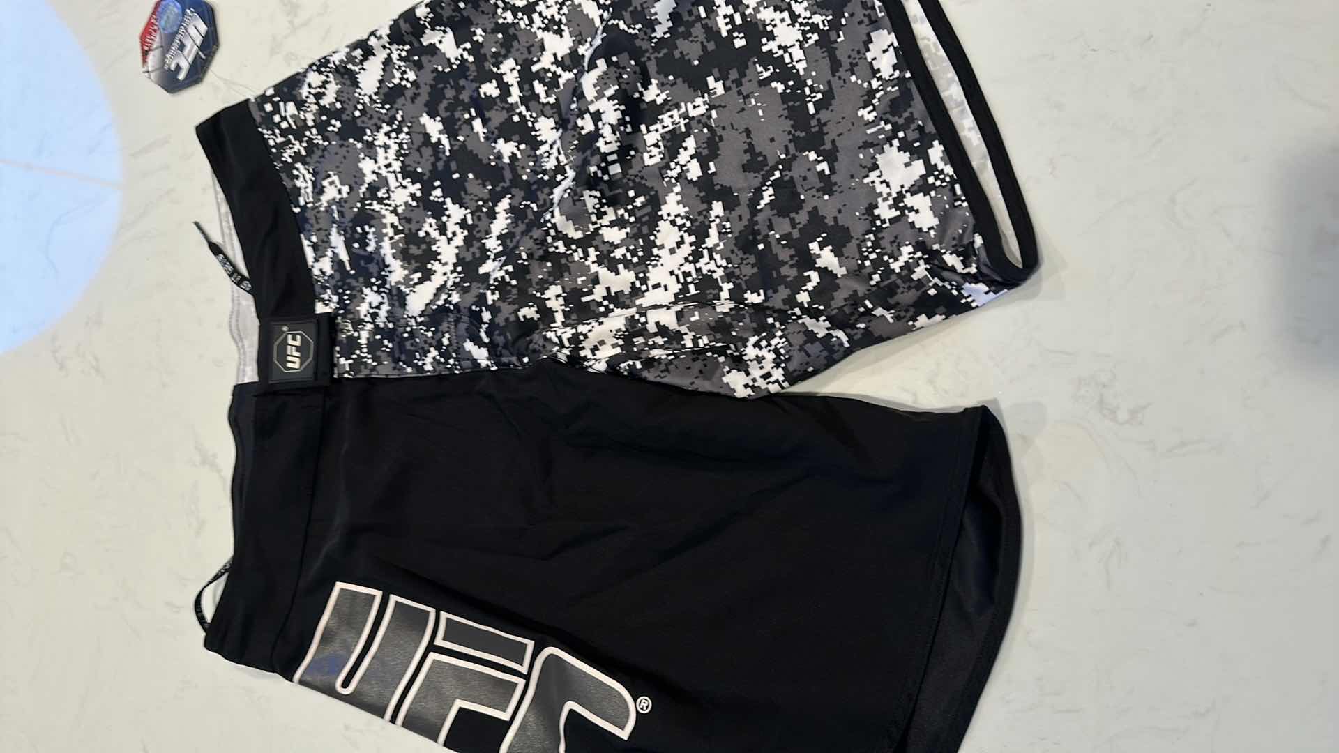 Photo 2 of OFFICIAL UFC TRAINING SHORTS SIZE 30