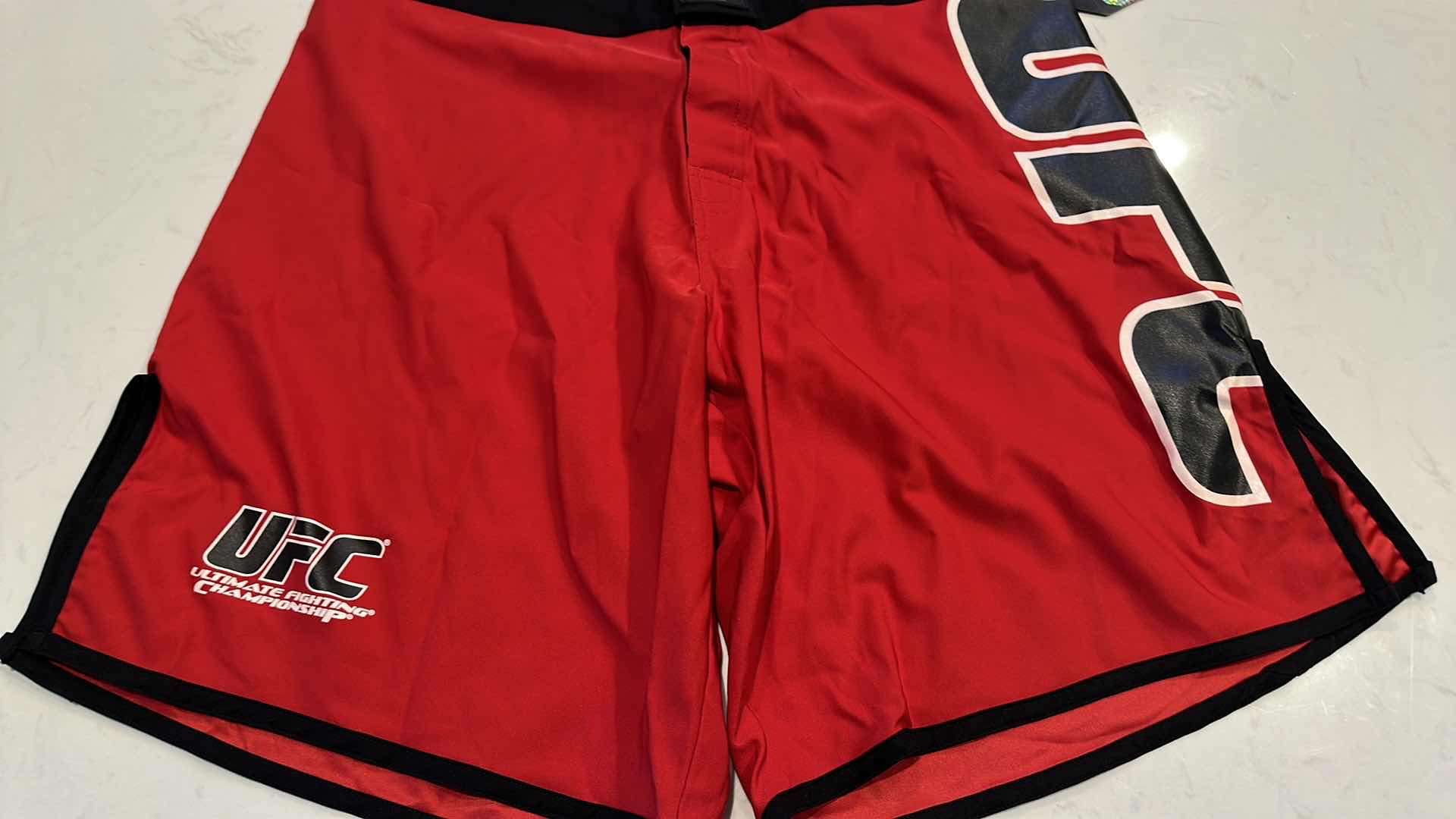 Photo 2 of OFFICIAL UFC TRAINING SHORTS SIZE 30