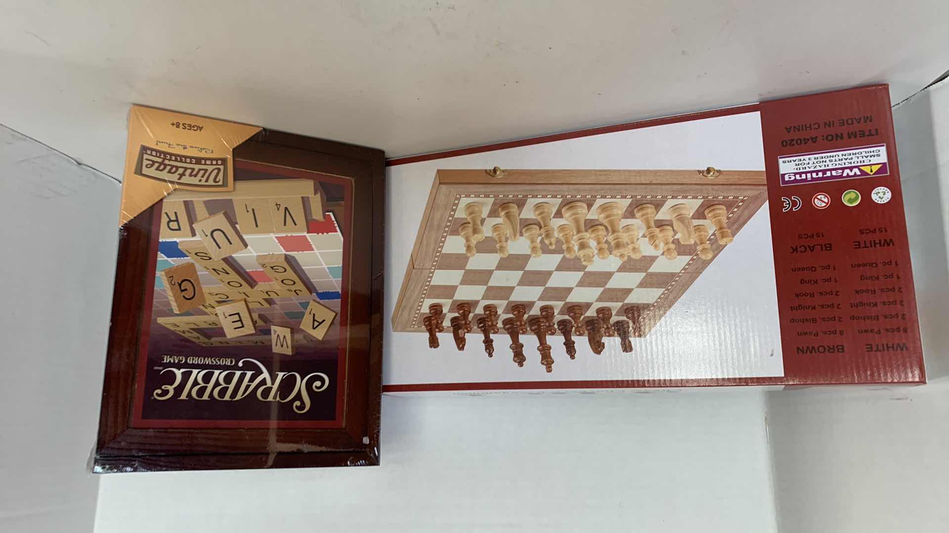 Photo 1 of SEALED SCRABBLE VINTAGE, BACKGAMMON CHESS SET, AND POKER CHIP SET