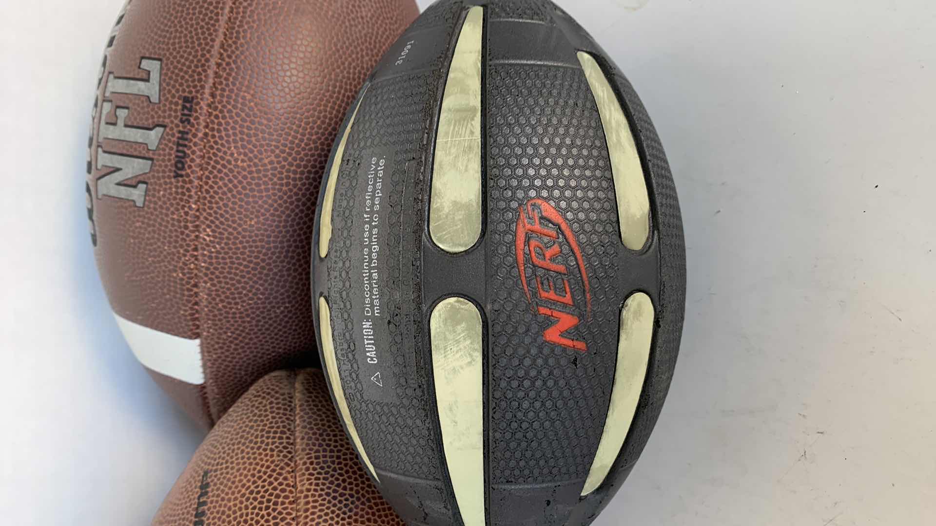 Photo 4 of WILSON NFL FOOTBALLS AND NERF FOOTBALL