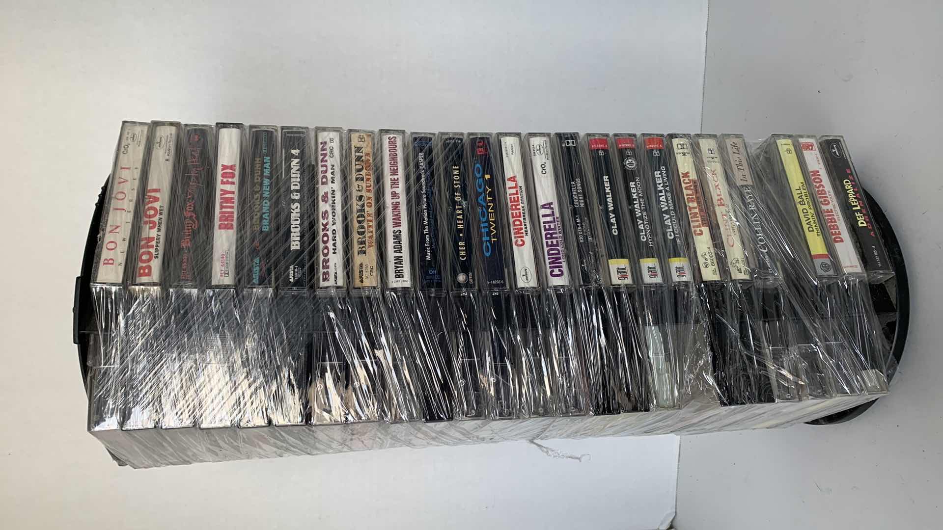 Photo 1 of MUSIC CASSETTES AND HOLDER