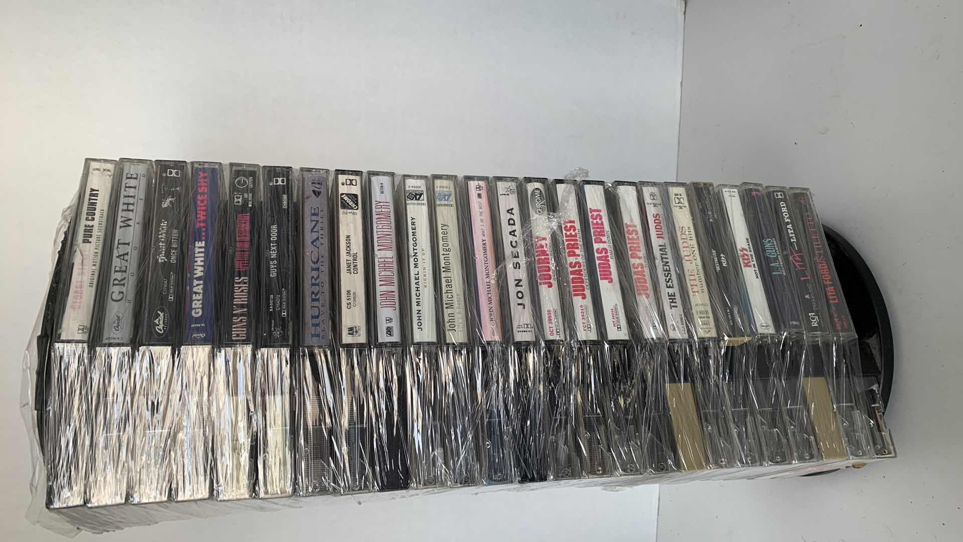 Photo 3 of MUSIC CASSETTES AND HOLDER