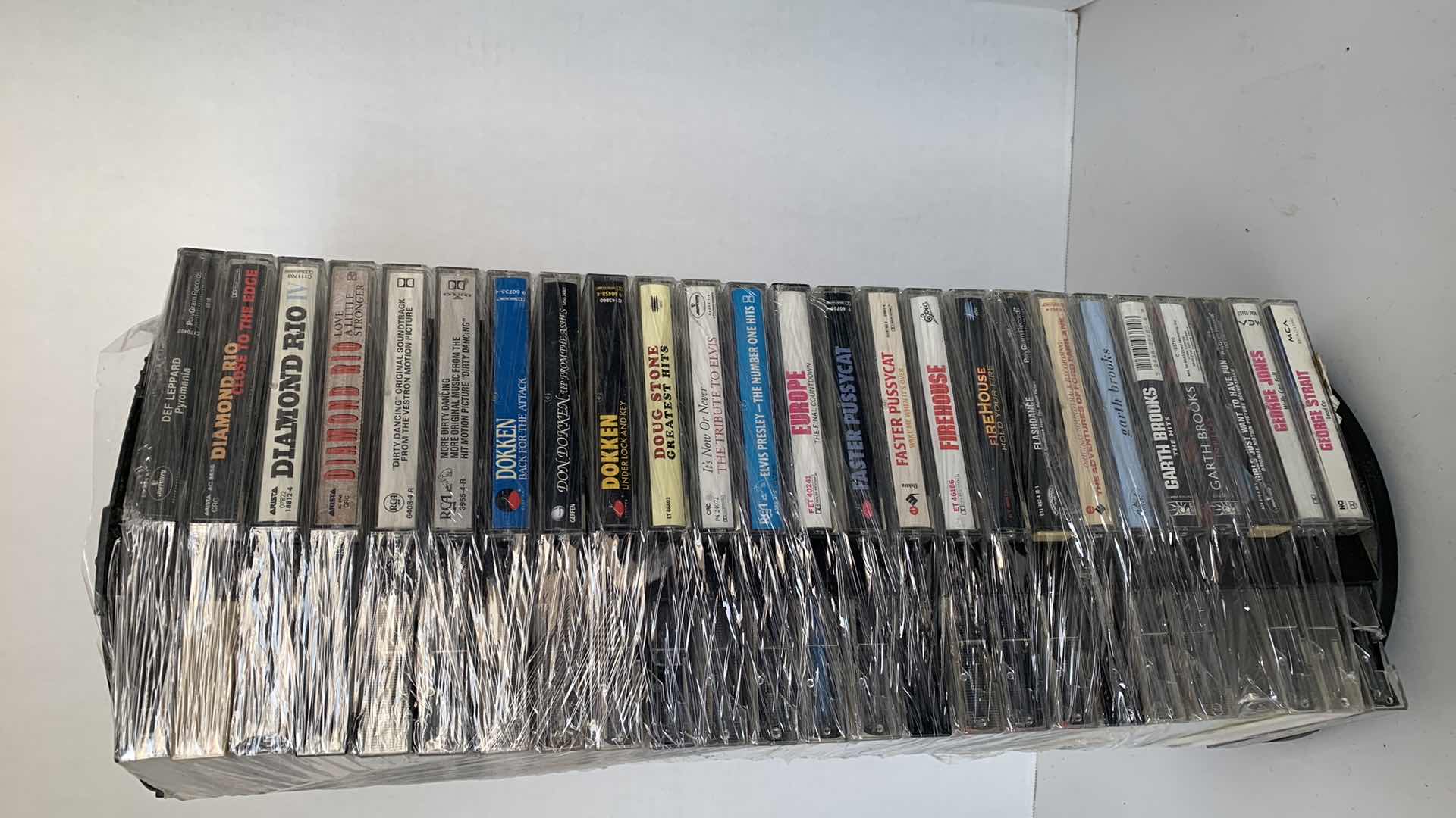 Photo 4 of MUSIC CASSETTES AND HOLDER