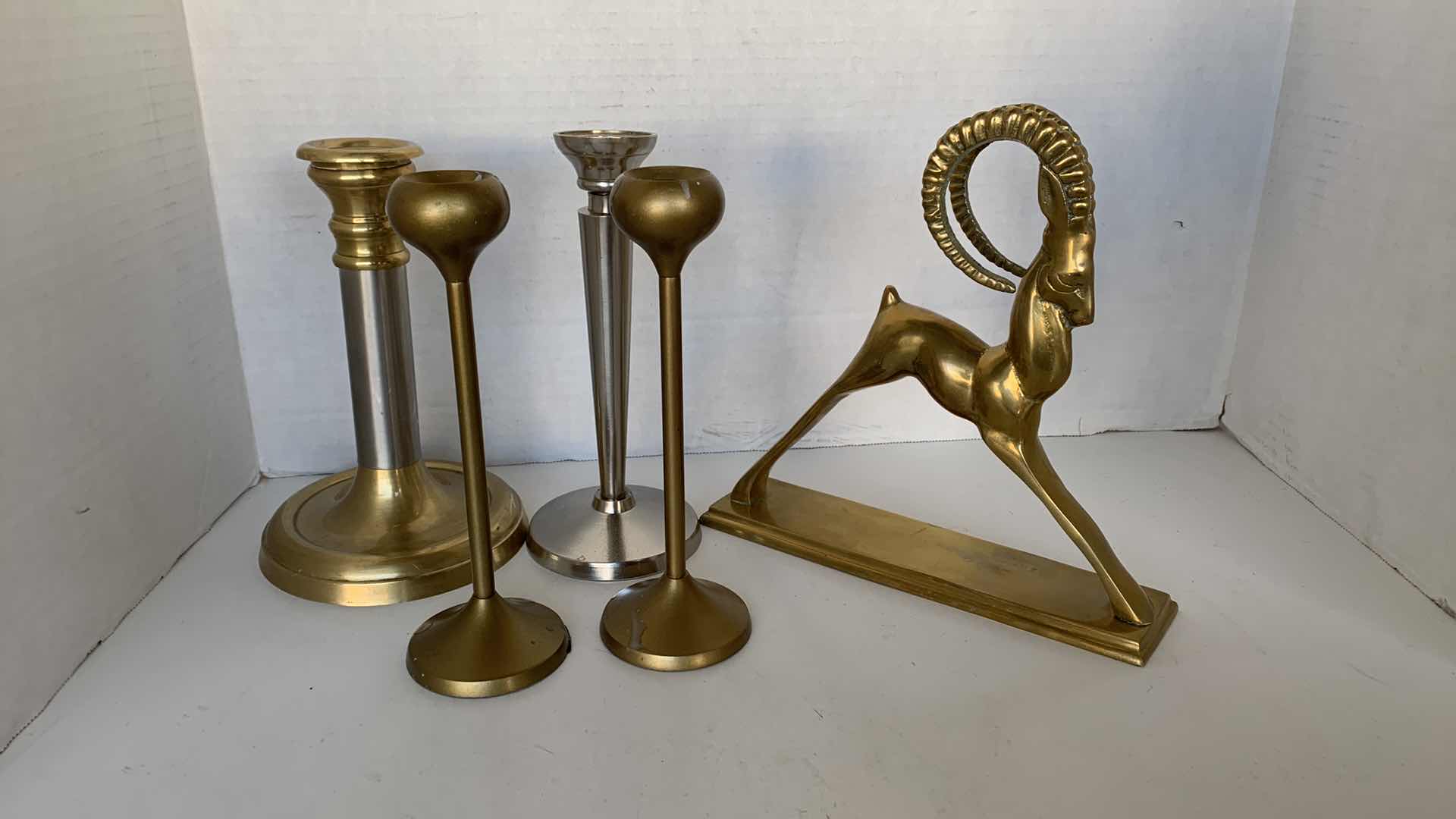 Photo 1 of CANDLE STICKS AND A VINTAGE BRASS GAZZELLE