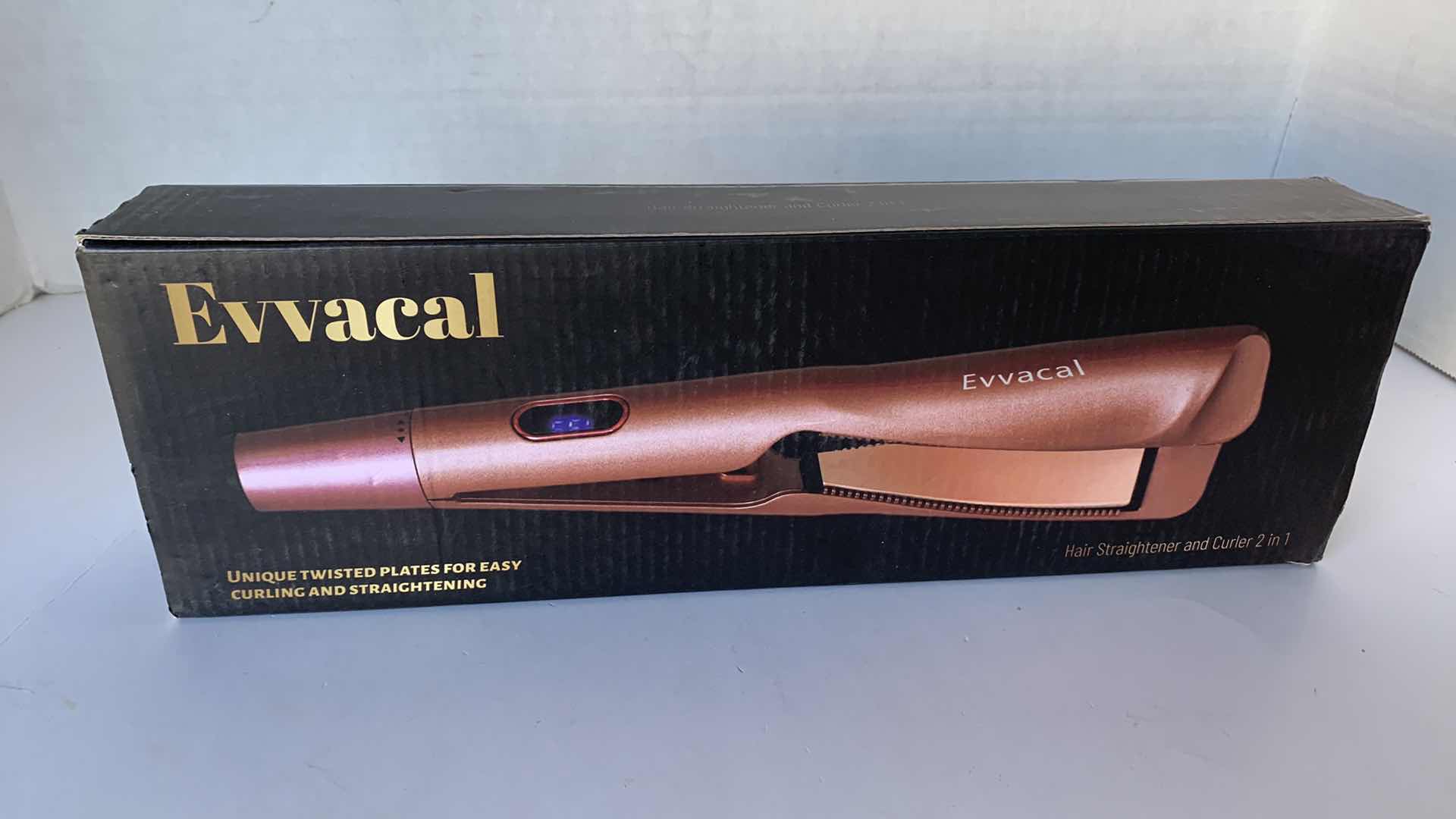 Photo 1 of EVVACAL HAIR STRAIGHTENER AND CURLER