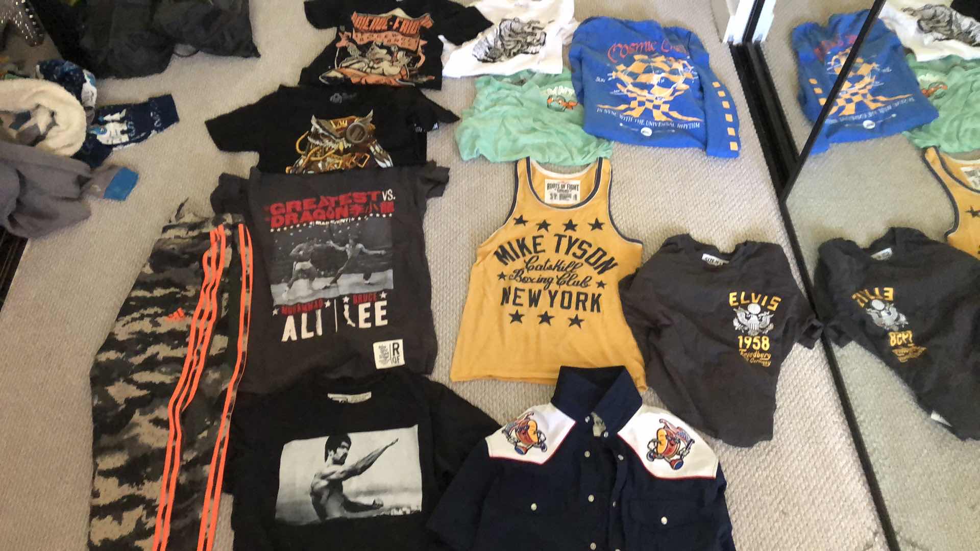 Photo 1 of ASSORTMENT OF GRAPHIC TEE SHIRTS AND ADIDAS PANTS