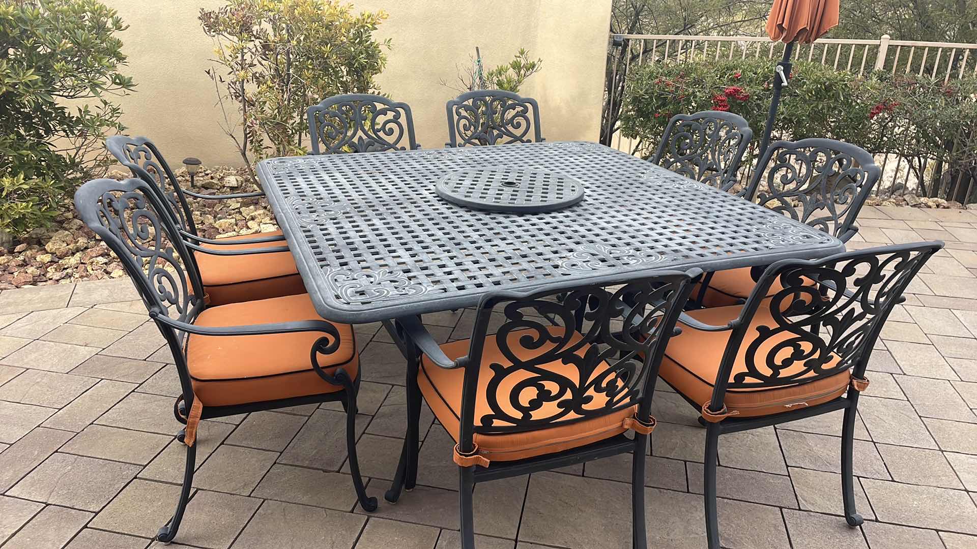 Photo 3 of LUXURY PATIO FURNITURE SET - TABLE 64” X 64” WITH 8 CHAIRS ORANGE CUSHIONS WITH BLACK WELTING