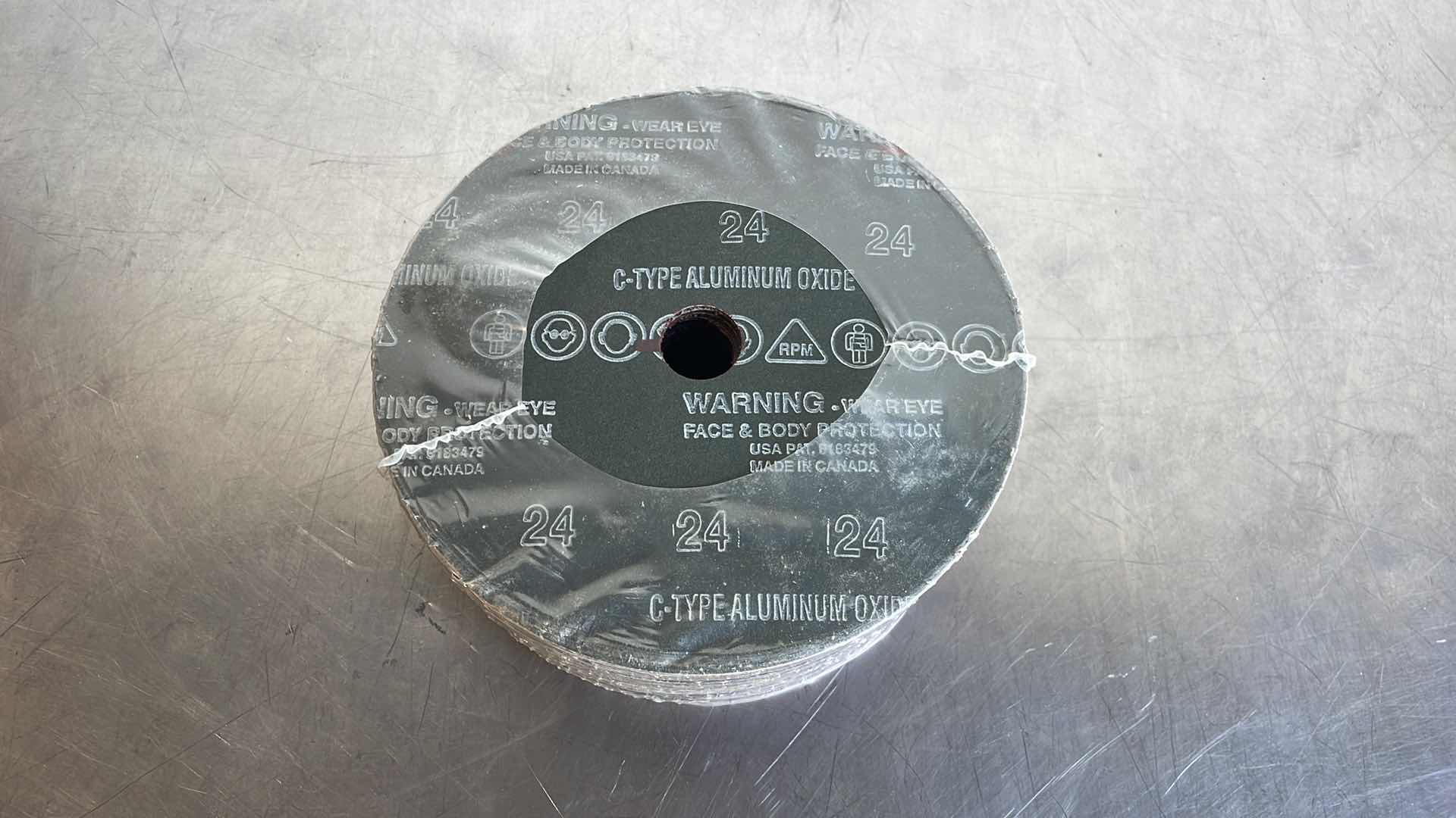 Photo 2 of GEMTEX ABRASIVES (52-
0033-24) 7" X 7/8" TYPE C
24 GRIT RESIN FIBRE
DISC 25 PACK