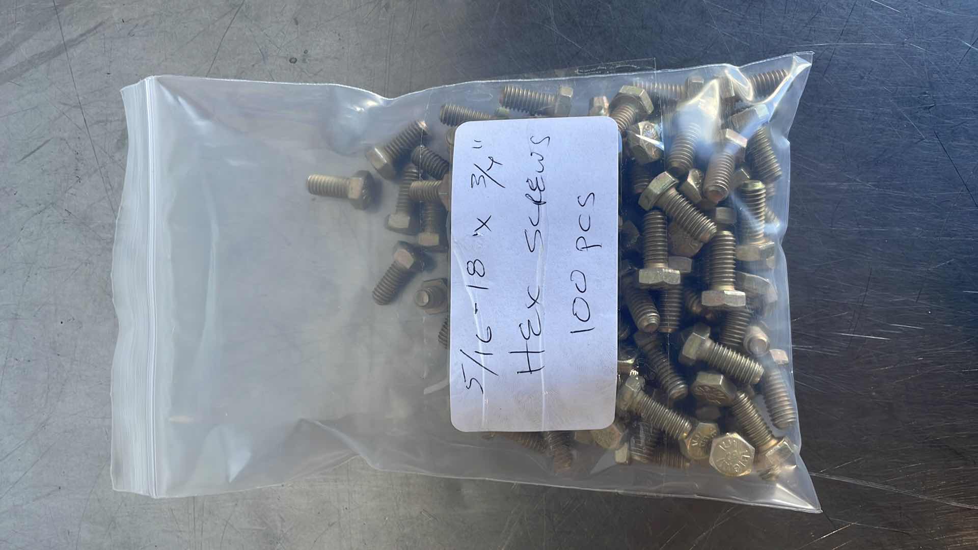 Photo 1 of 5/6”-18 X ¾”HEX SCREW 100 PCS