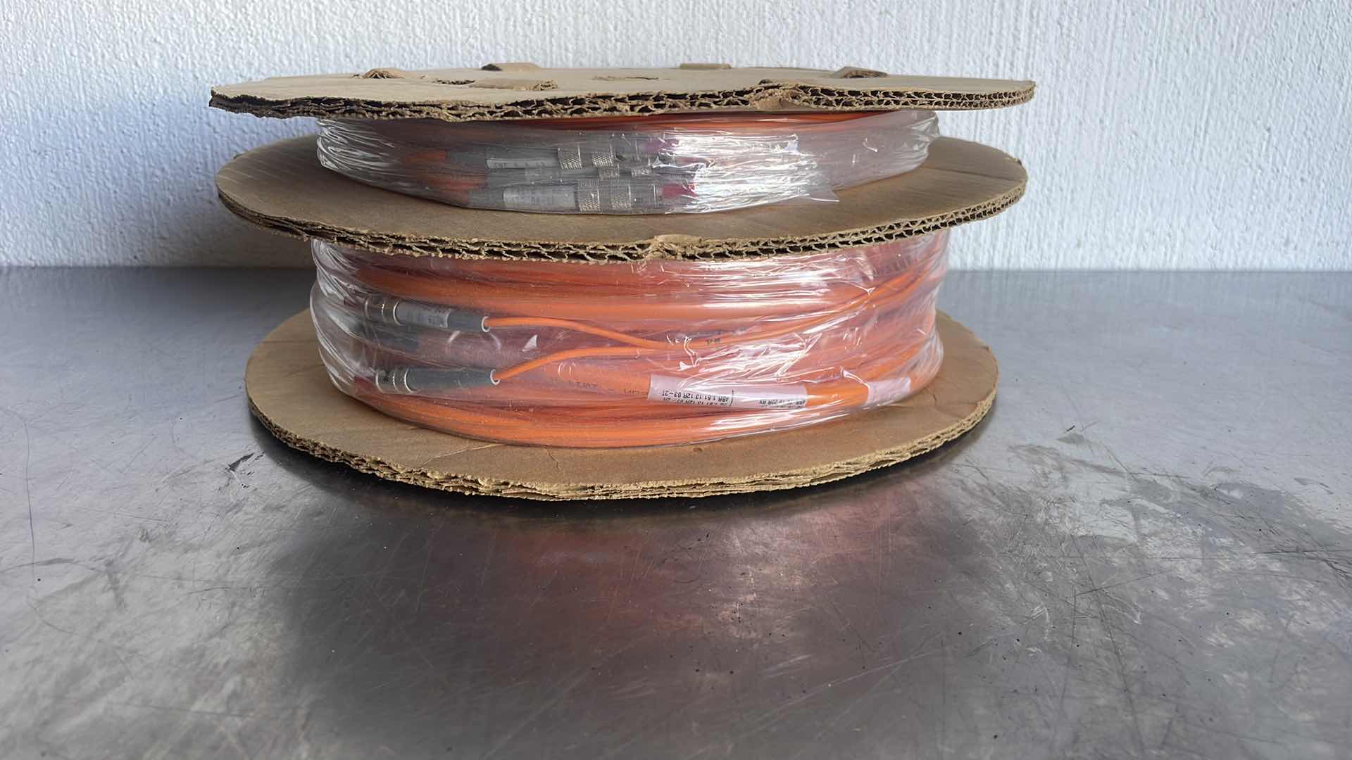 Photo 1 of NORTEL NT0X97AK (68.9’ OR 21M) QUAD FIBER OPTIC CABLE REEL